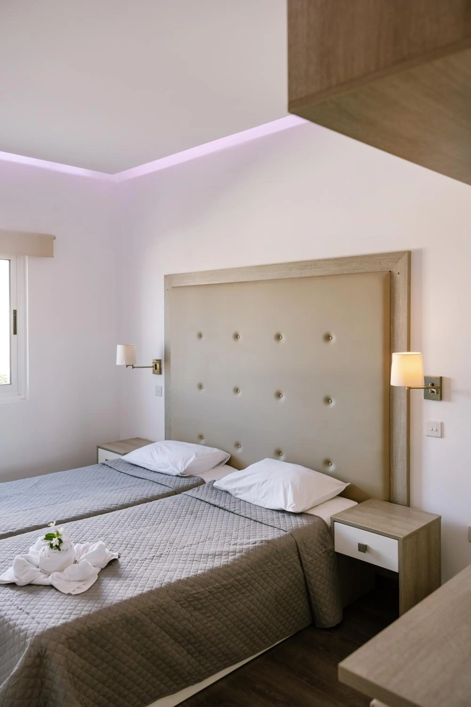 Bed in Neptune Hotel Apartments Paphos