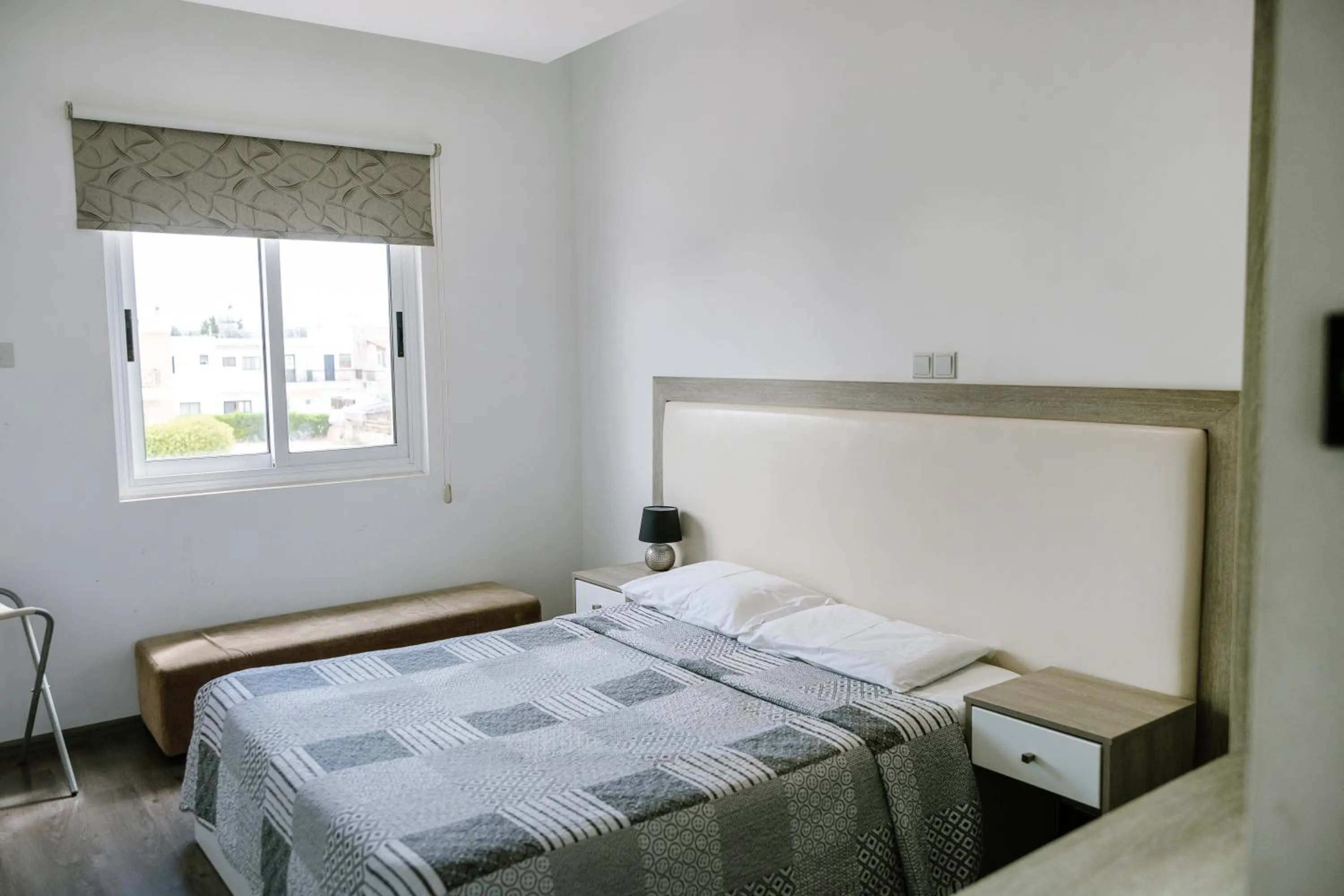 Bed in Neptune Hotel Apartments Paphos