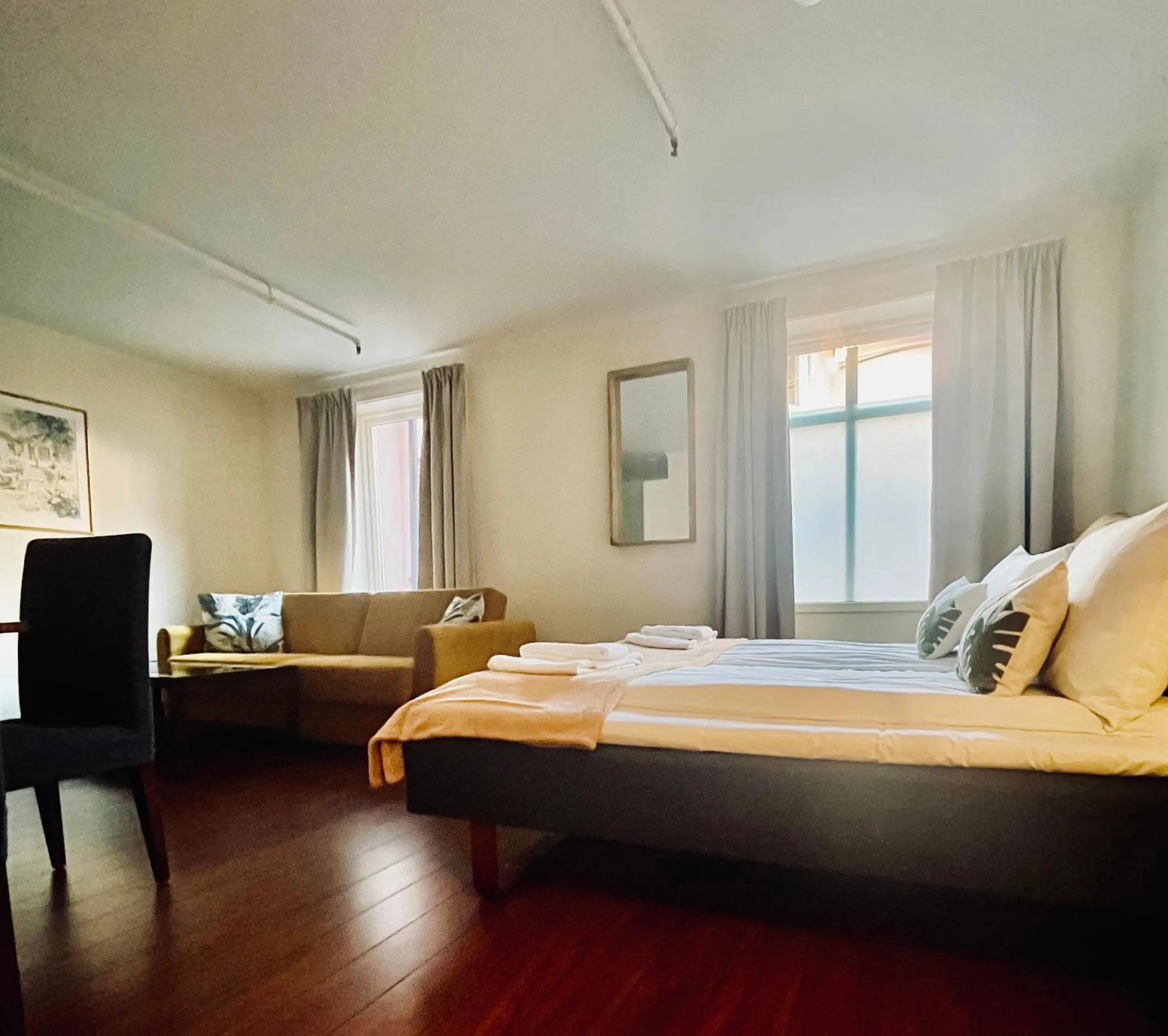 Photo of the whole room, Bed in Victoria Hotel Kragerø