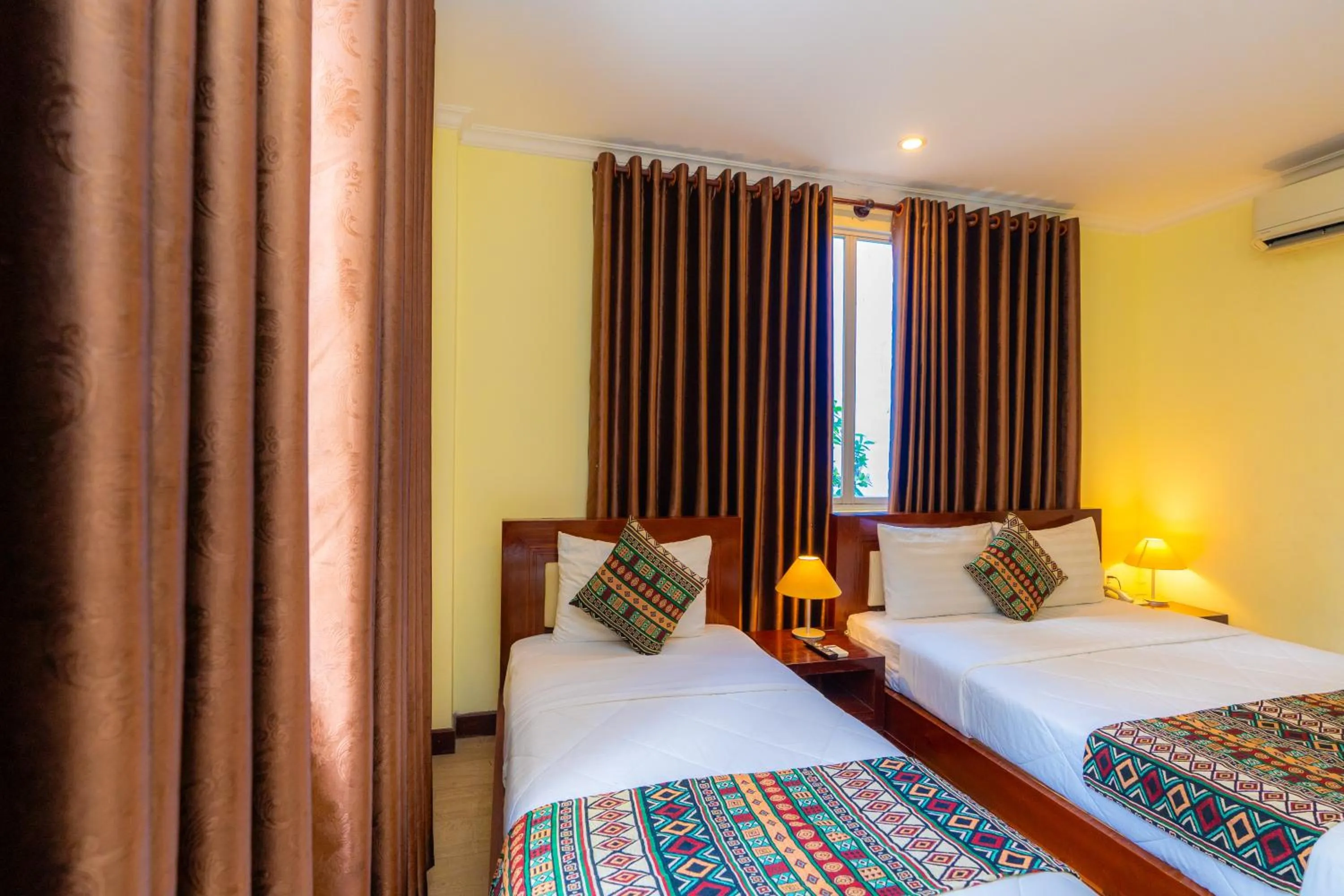 Bed in Hoang Ha Boutique Hotel