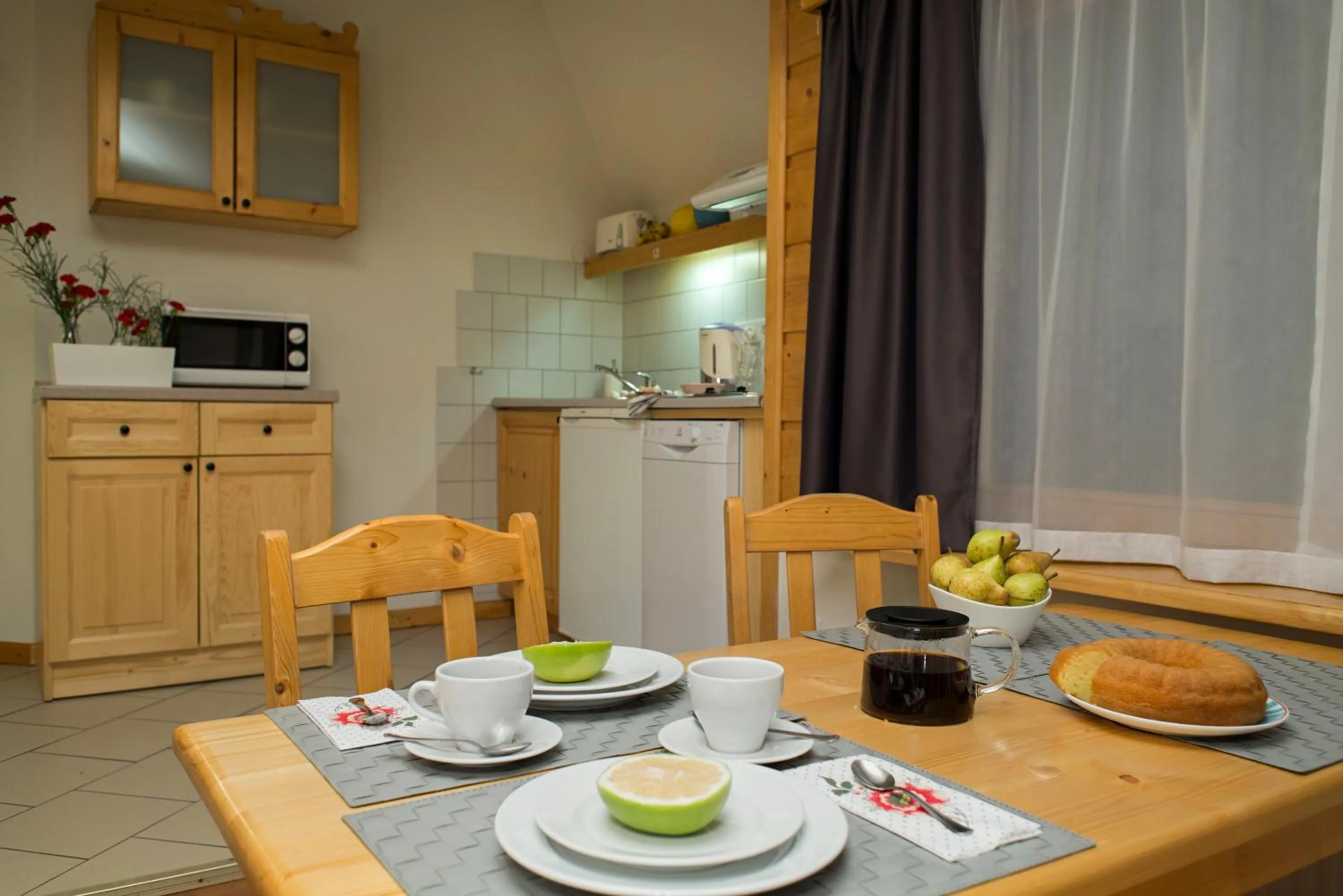 Kitchen or kitchenette in Apartamenty ApartArt Zakopane