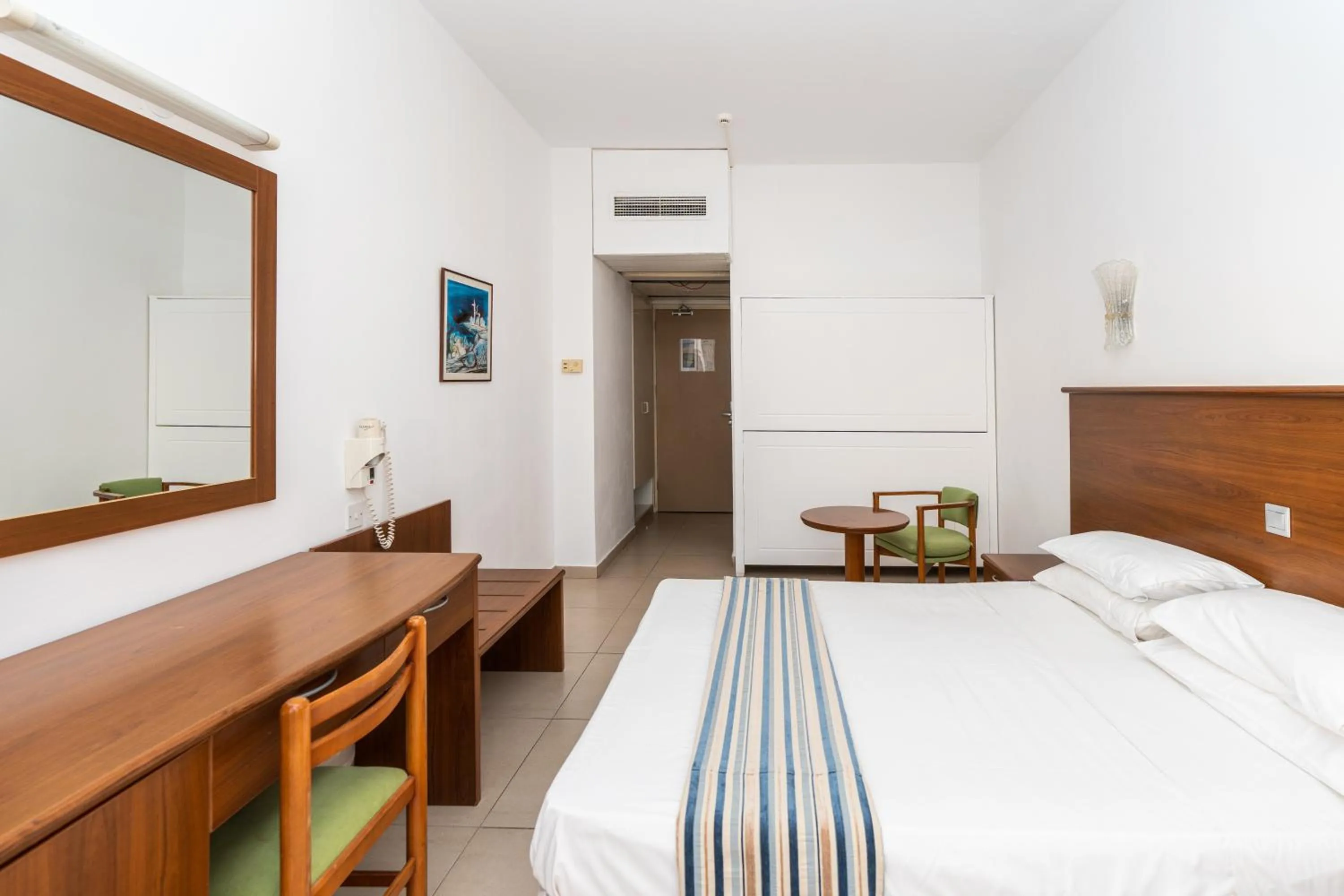 Triple Room with Side Sea View (2 adults + 1 child) in Adelais Bay Hotel