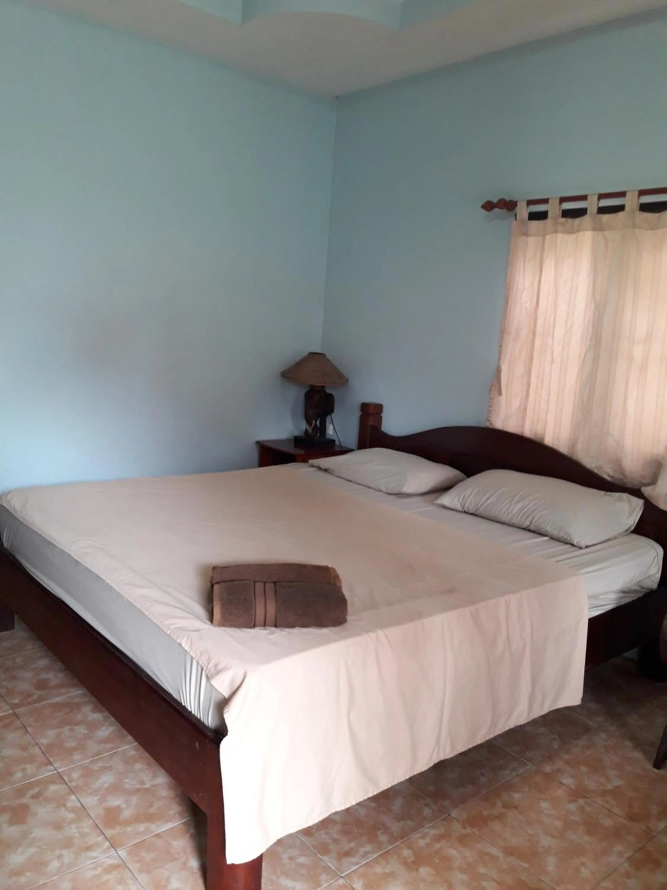 Bed in Jungle Hut Bungalows & Hotel