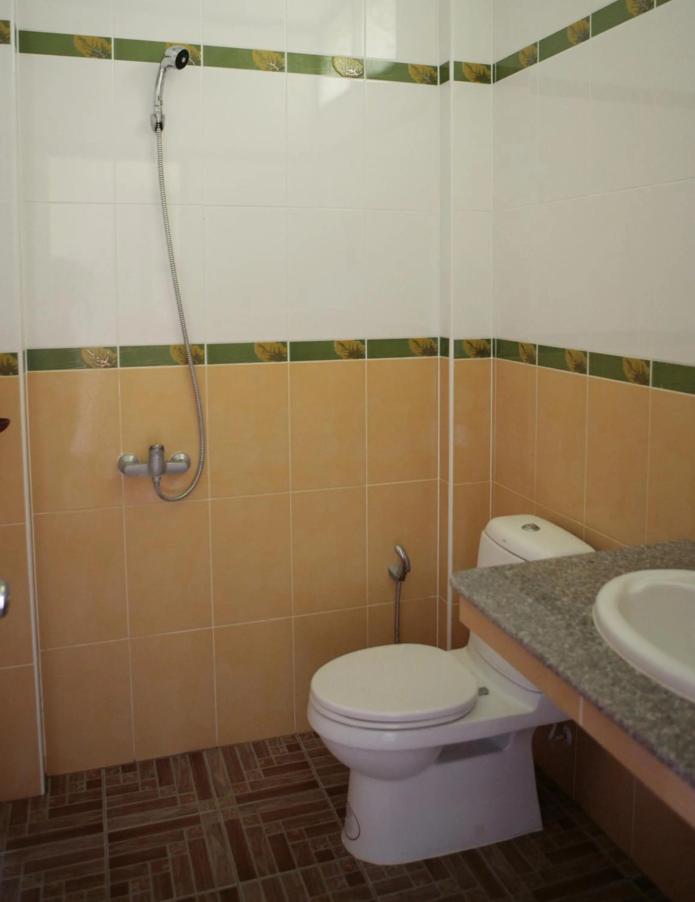 Toilet in Jungle Hut Bungalows & Hotel