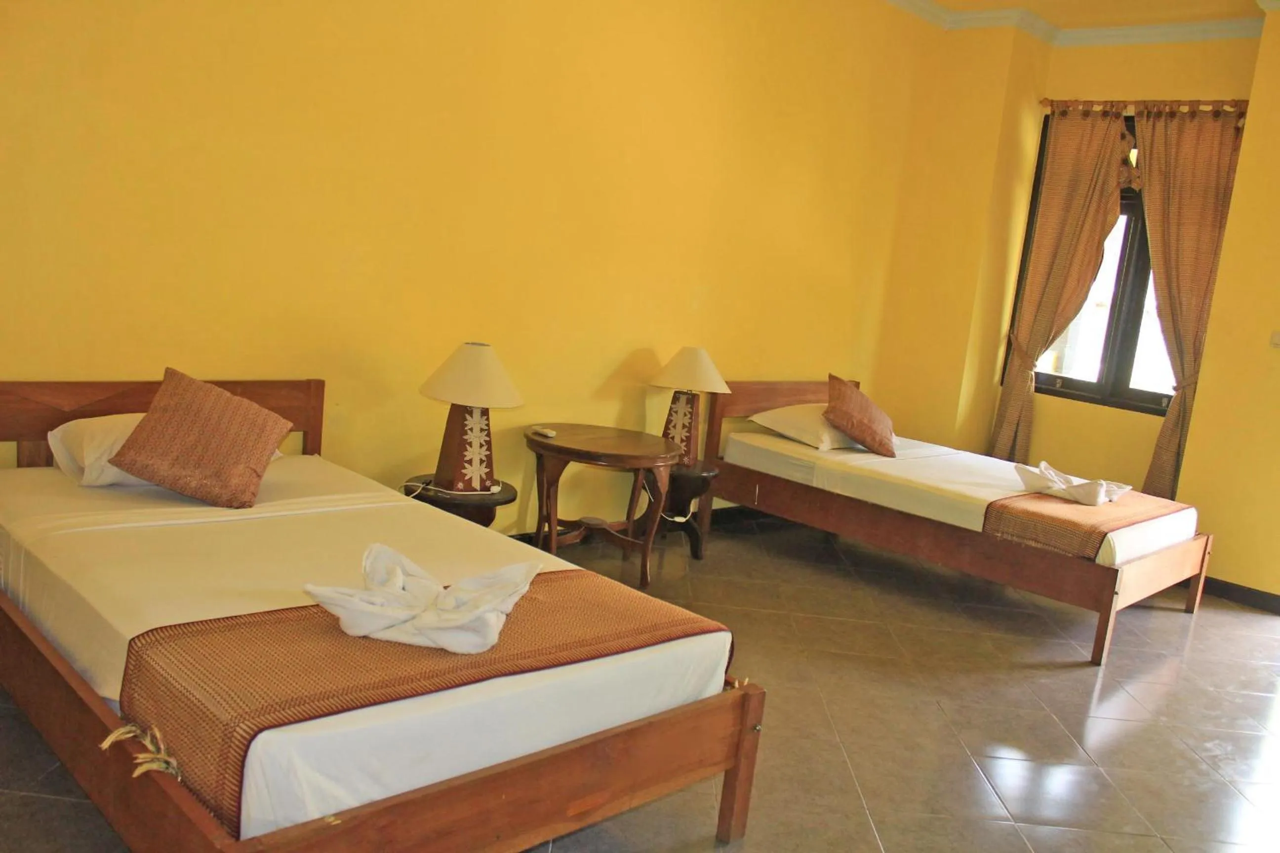 Bed in Gili Welldone Guesthouse