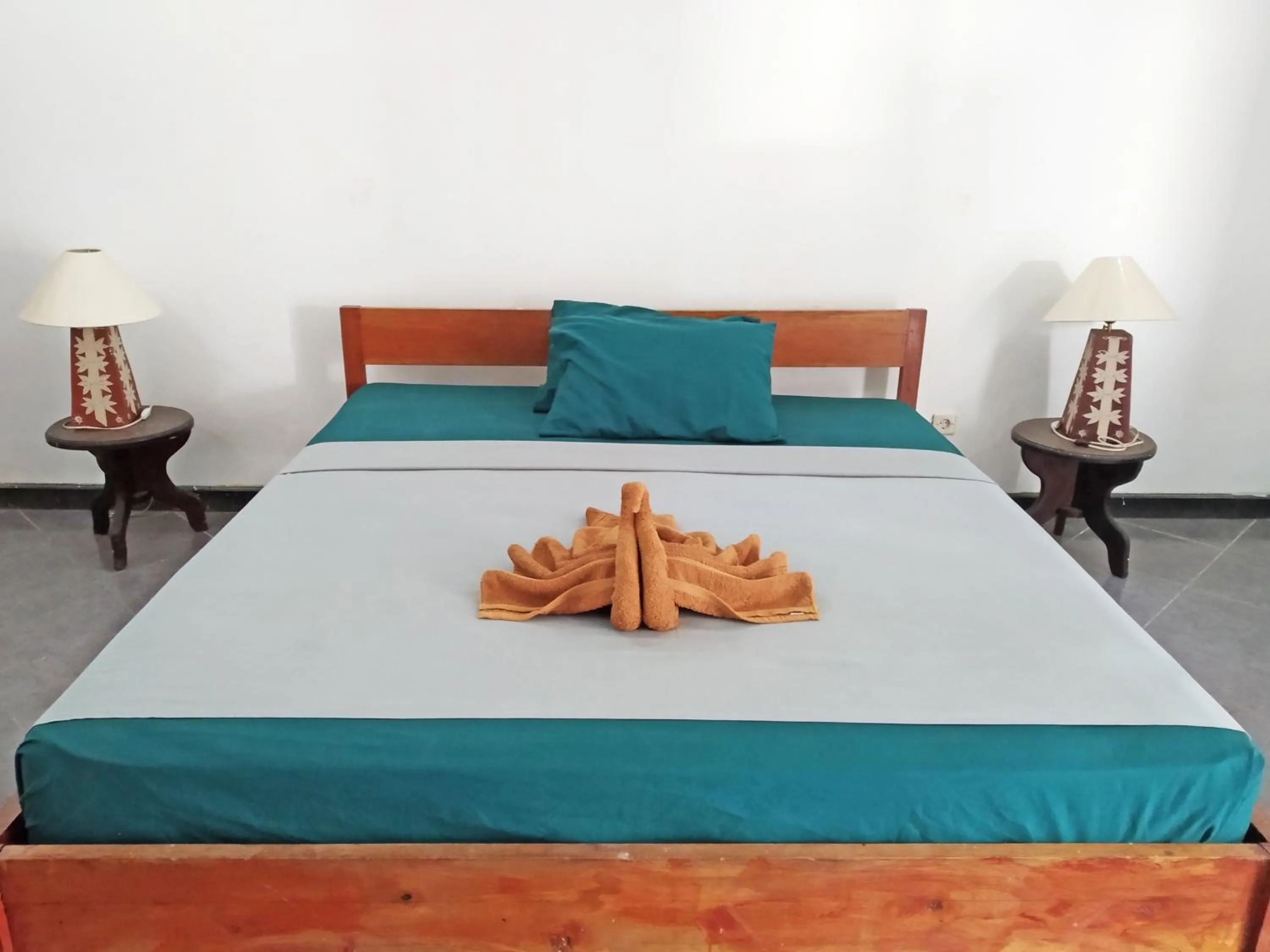 Bed in Gili Welldone Guesthouse