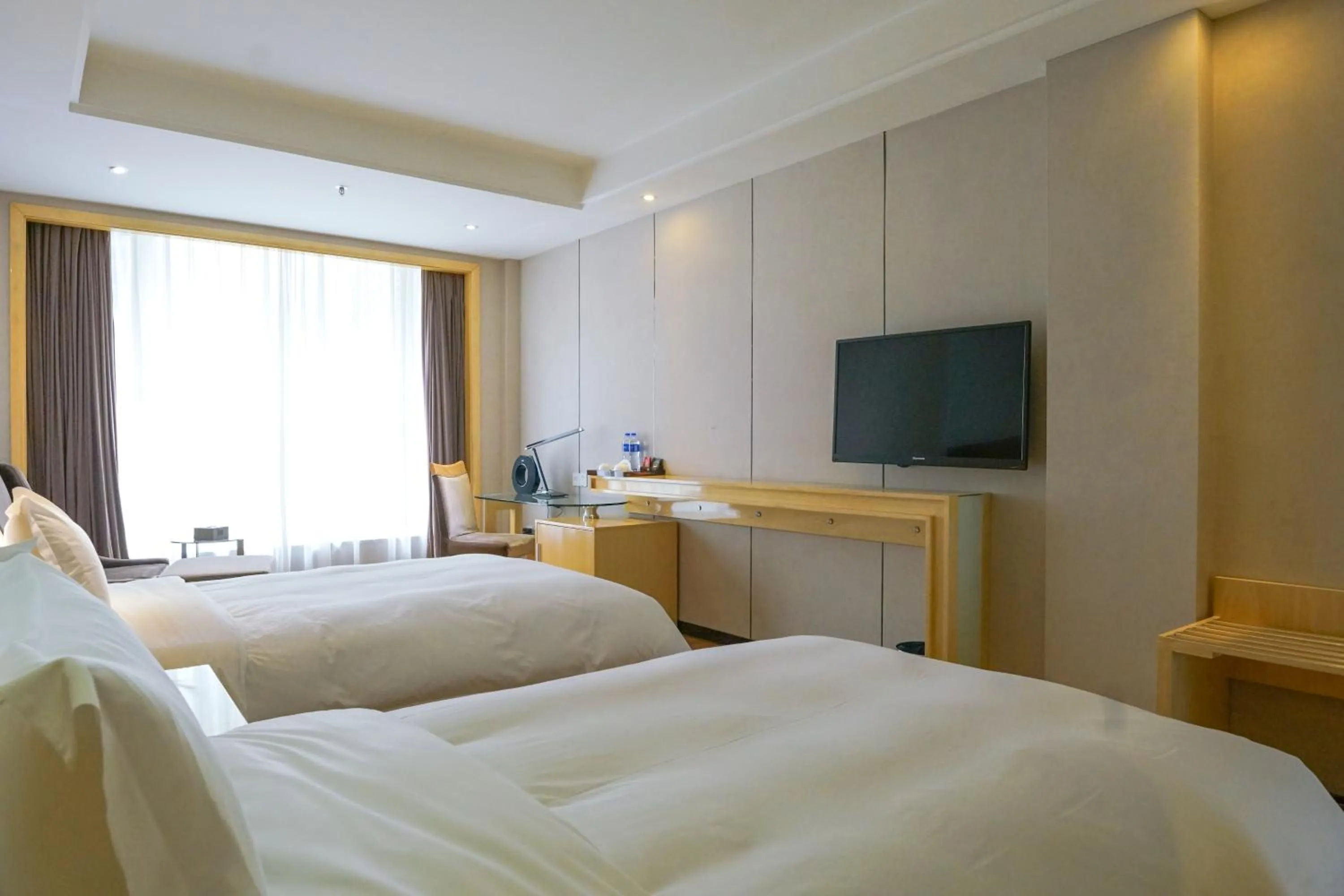 Photo of the whole room, Bed in Paco Hotel Ouzhuang Metro Guangzhou