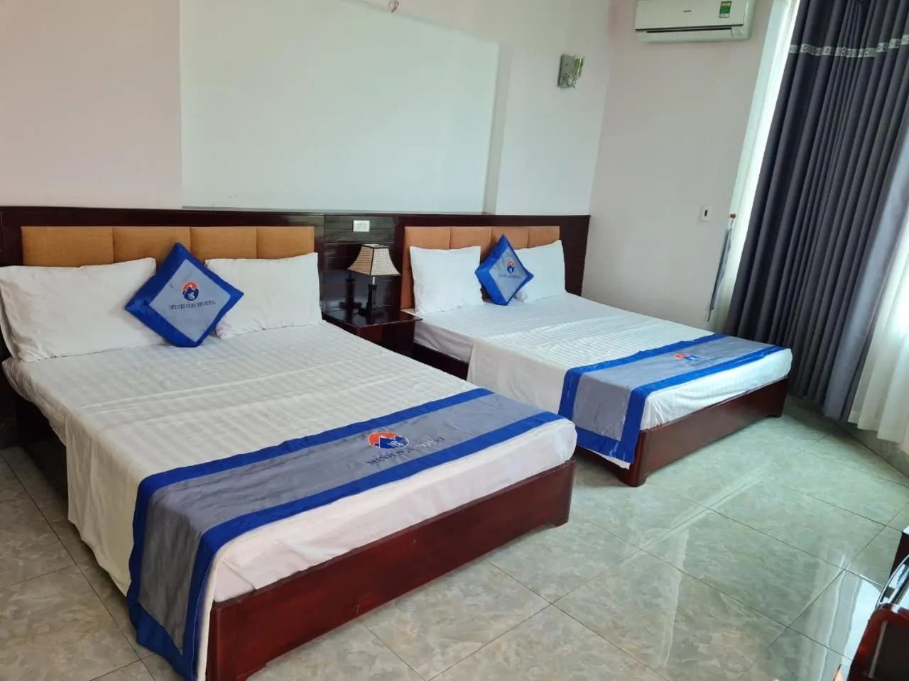 Bed in Minh Sơn HOTEL