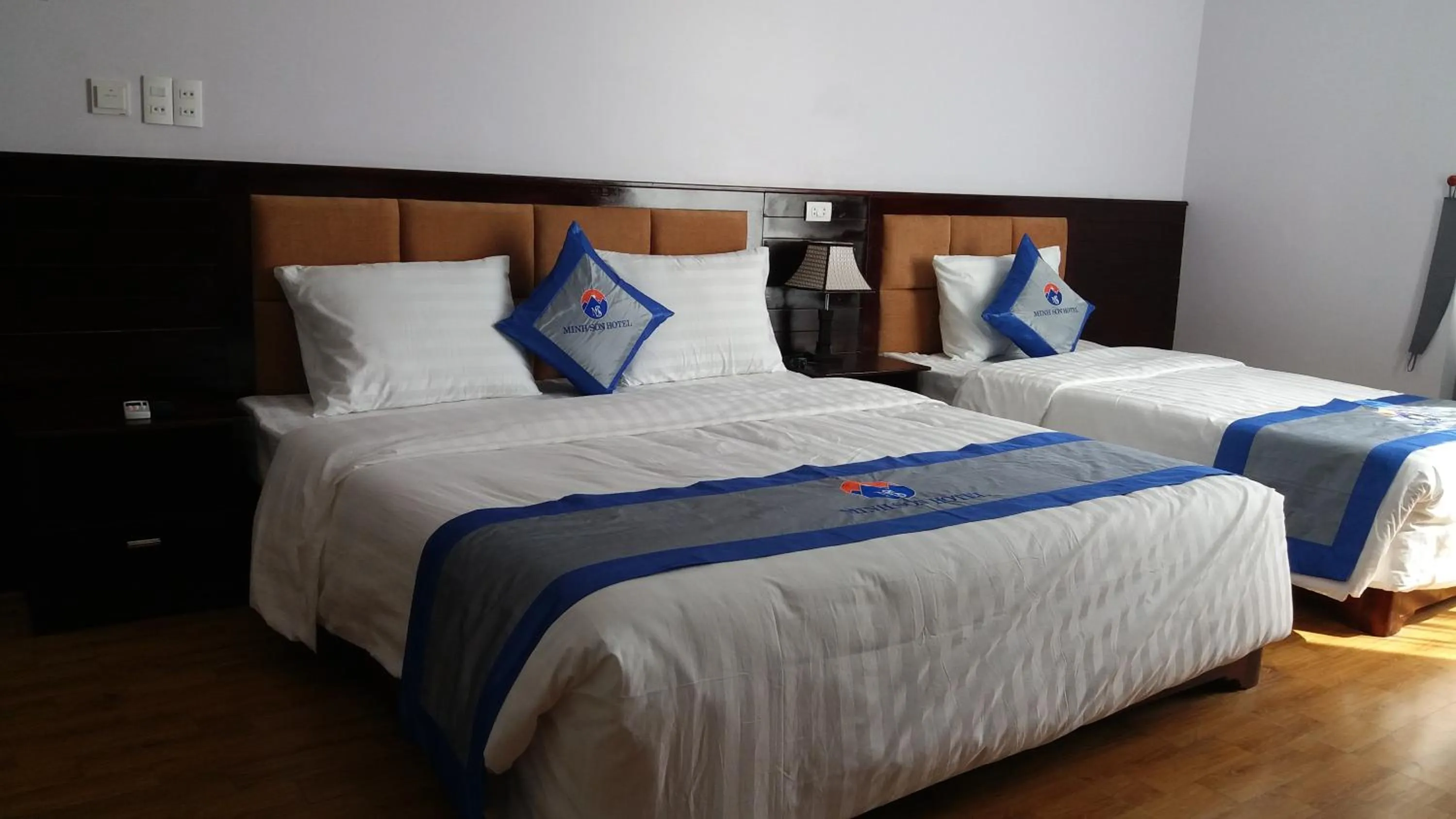 Bed in Minh Sơn HOTEL