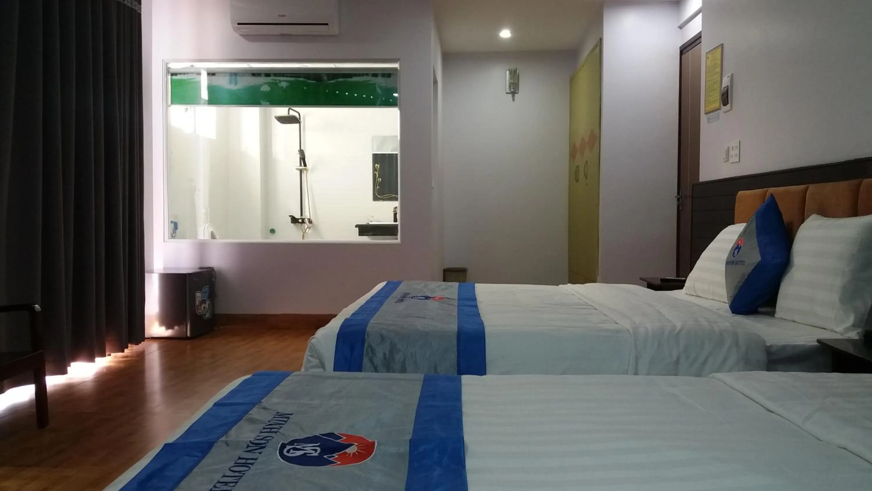 Bed in Minh Sơn HOTEL