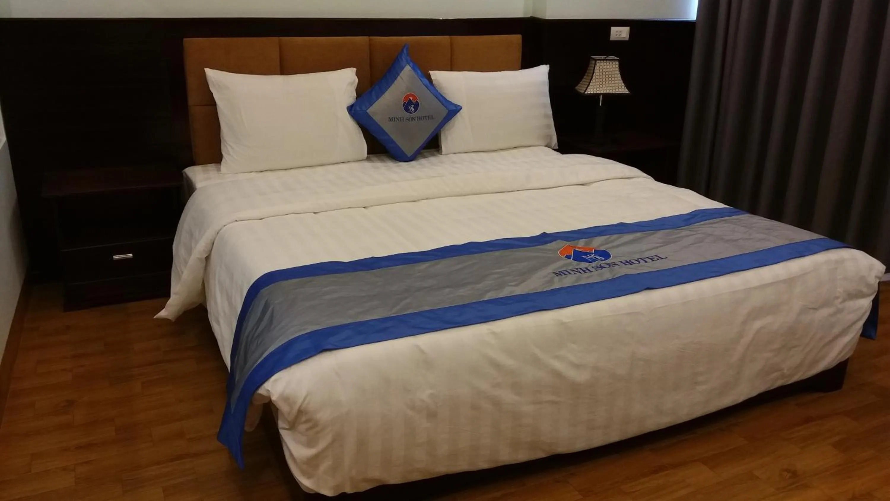 Bed in Minh Sơn HOTEL