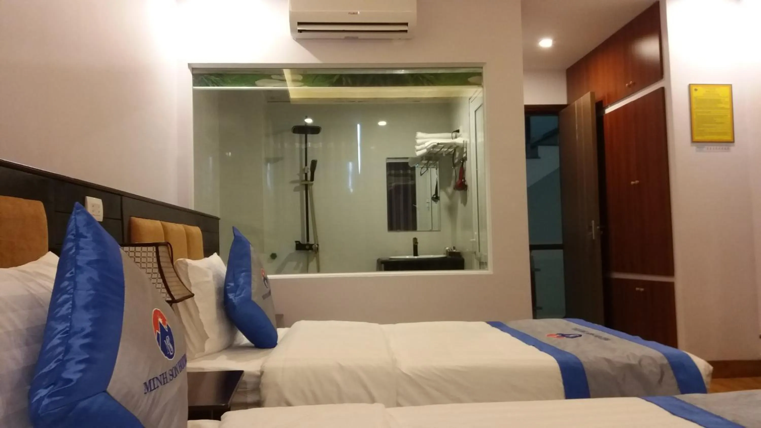Bed in Minh Sơn HOTEL