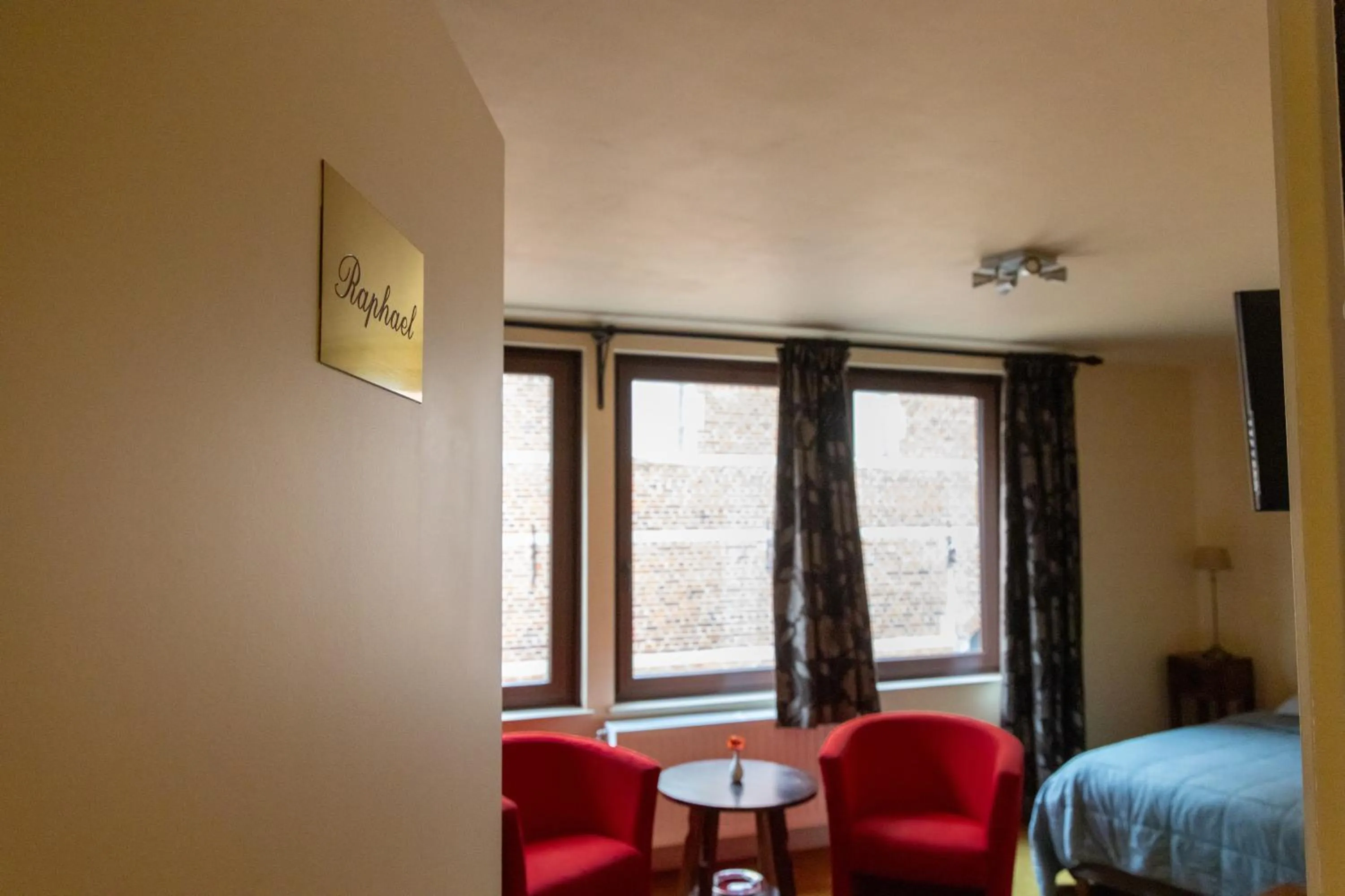 Seating area, Bed in Hotel De Pastorij