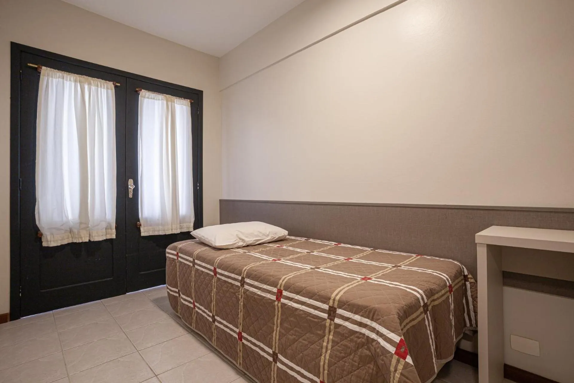 Bed in A Furninha Hotel