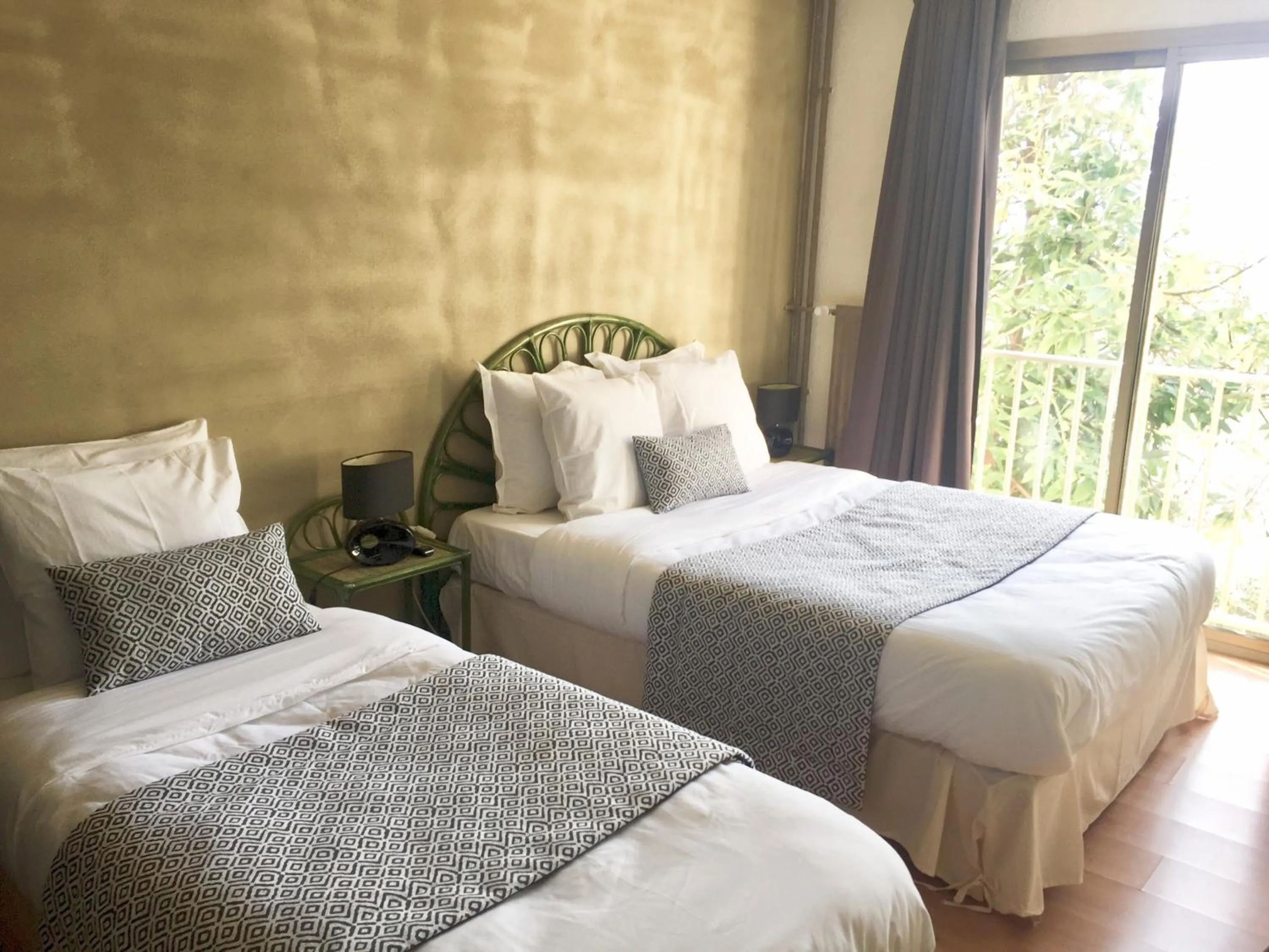 Bed in Avocado Hôtel Restaurant