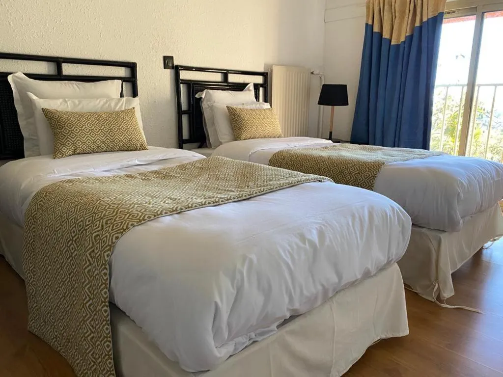 Bed in Avocado Hôtel Restaurant