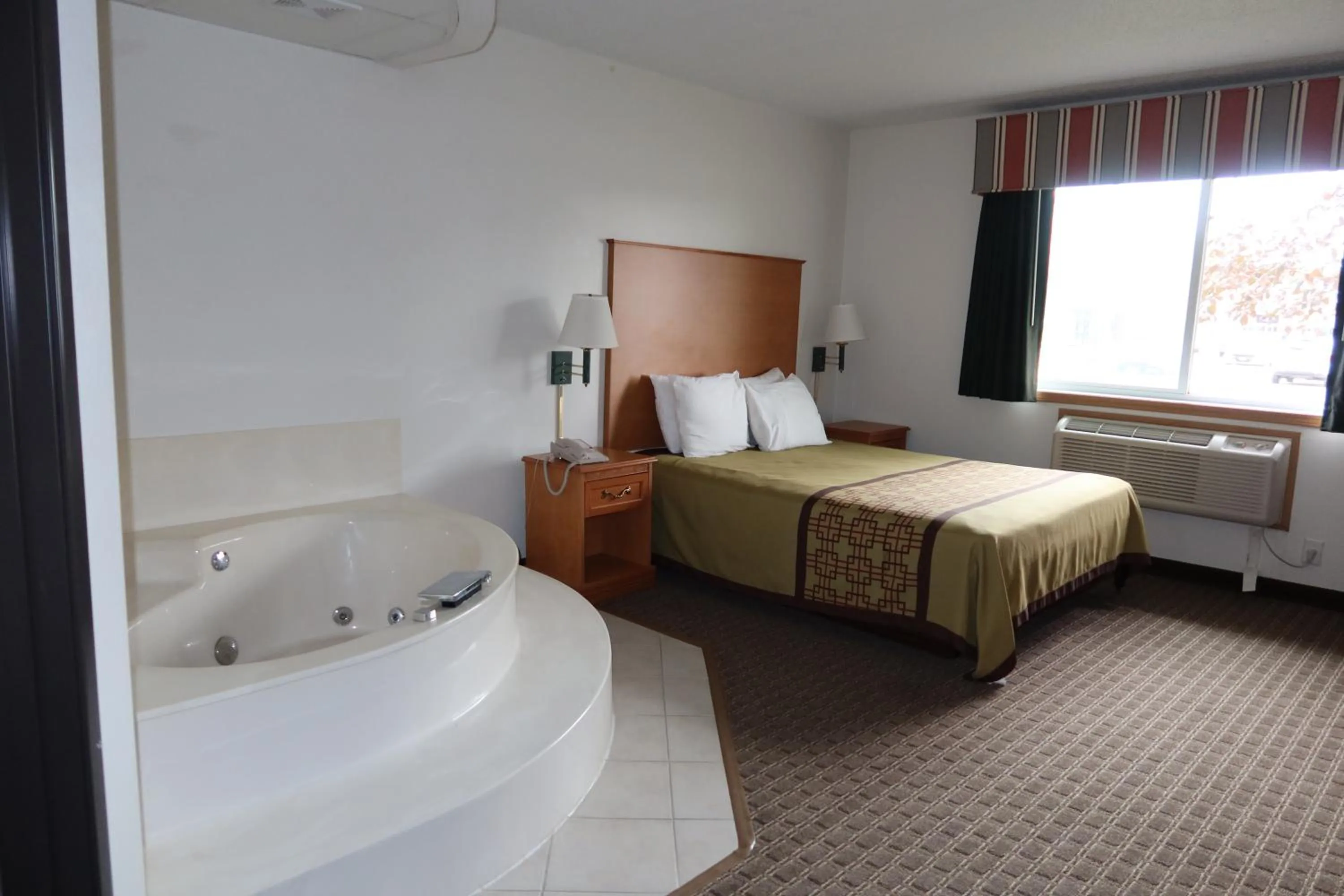 Bed in Americas Best Value Inn