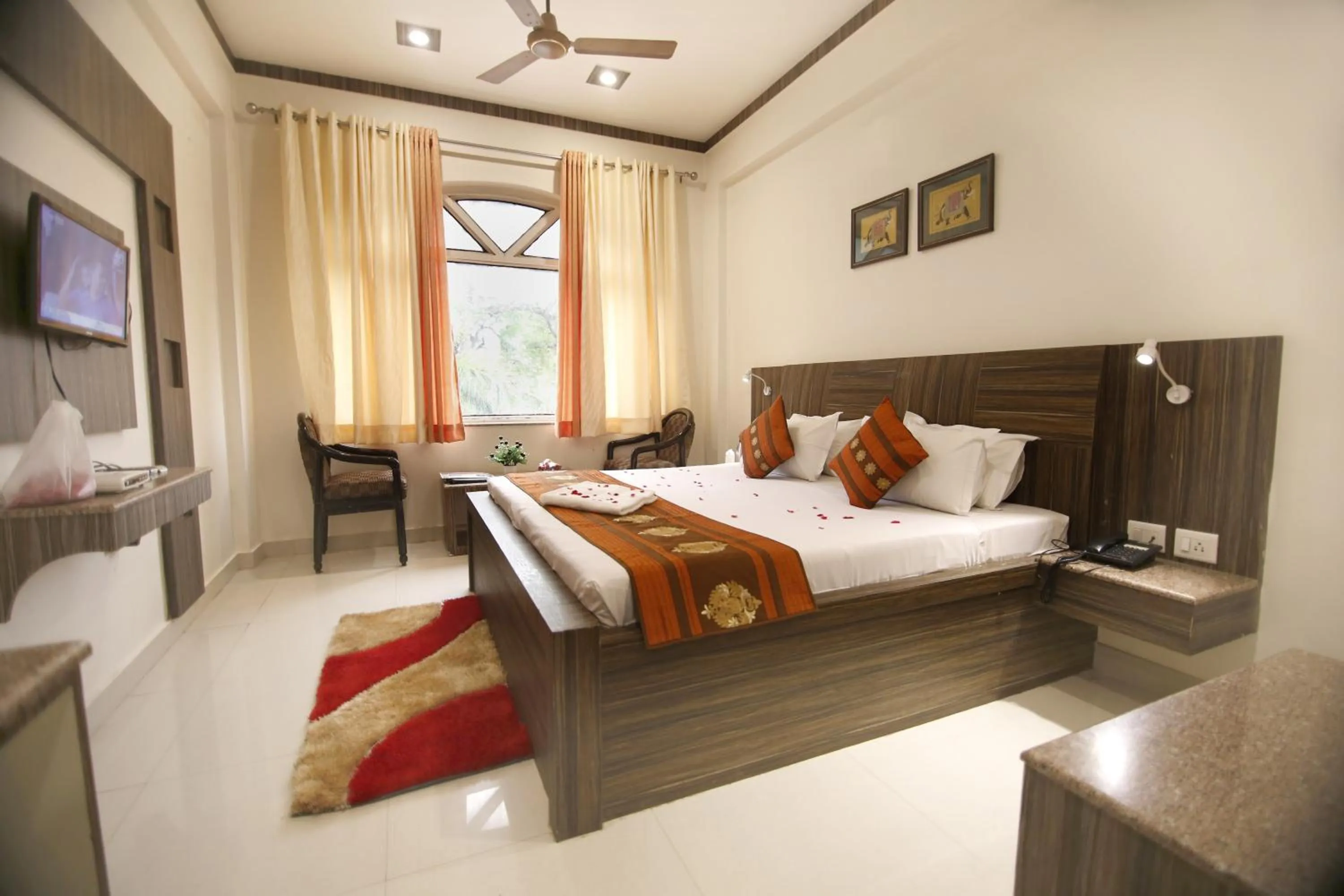 Bedroom, Bed in Hotel Sheetal Regency,Near Janambhumi