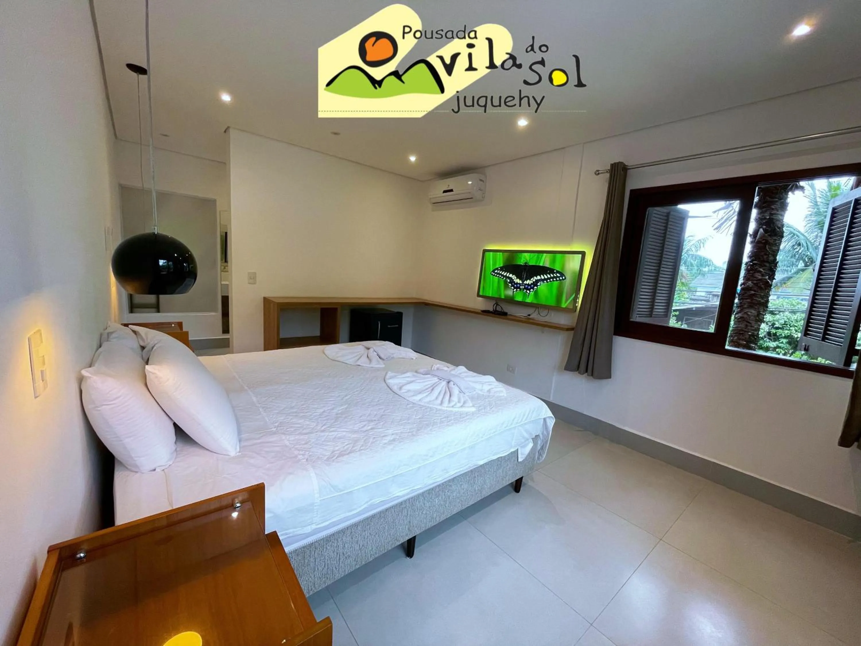 Bed in Pousada Vila do Sol Juquehy