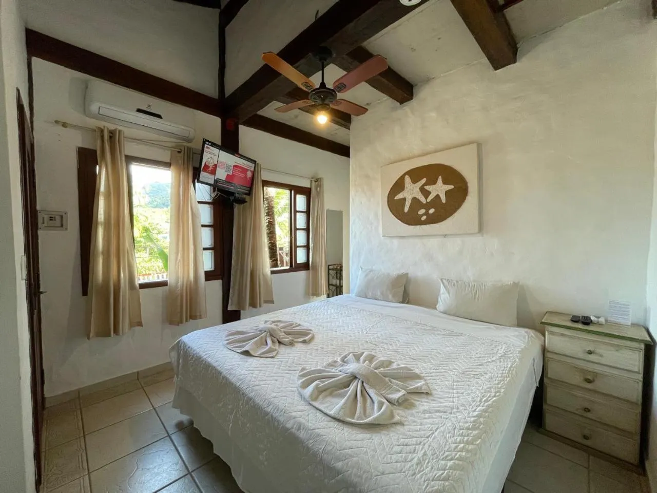 Bed in Pousada Vila do Sol Juquehy