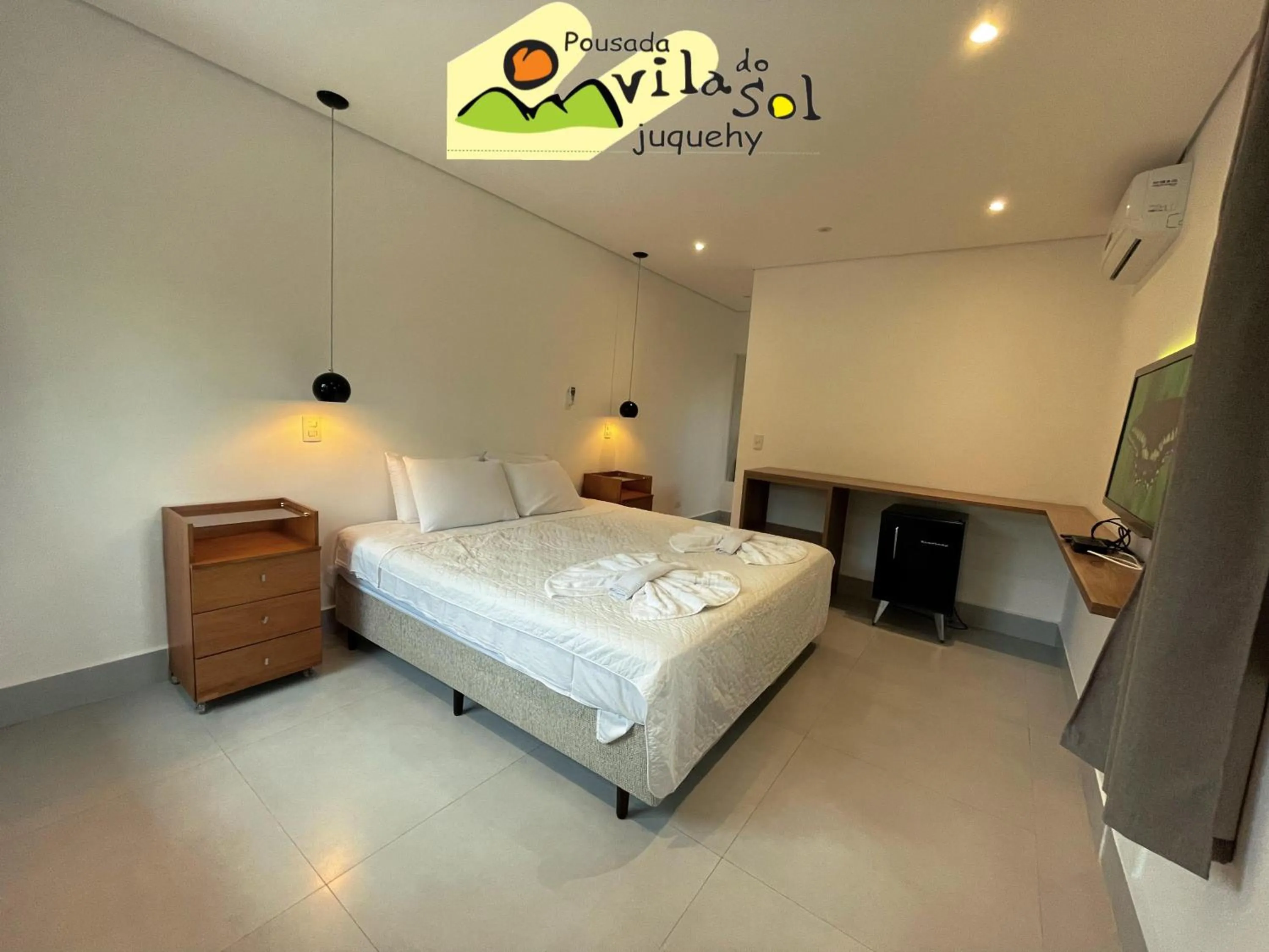 Bed in Pousada Vila do Sol Juquehy