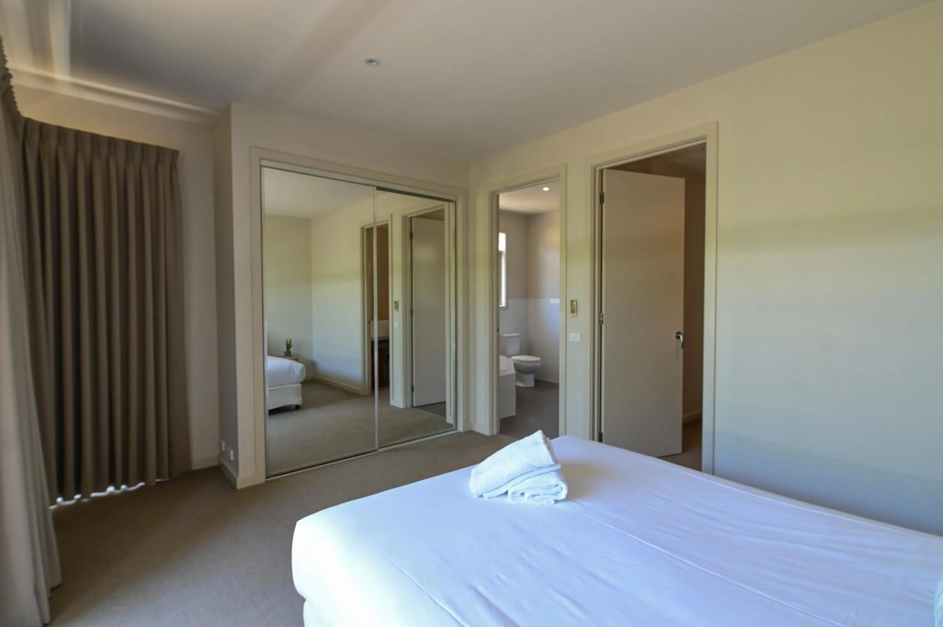 Bed in Central Shepparton Apartments