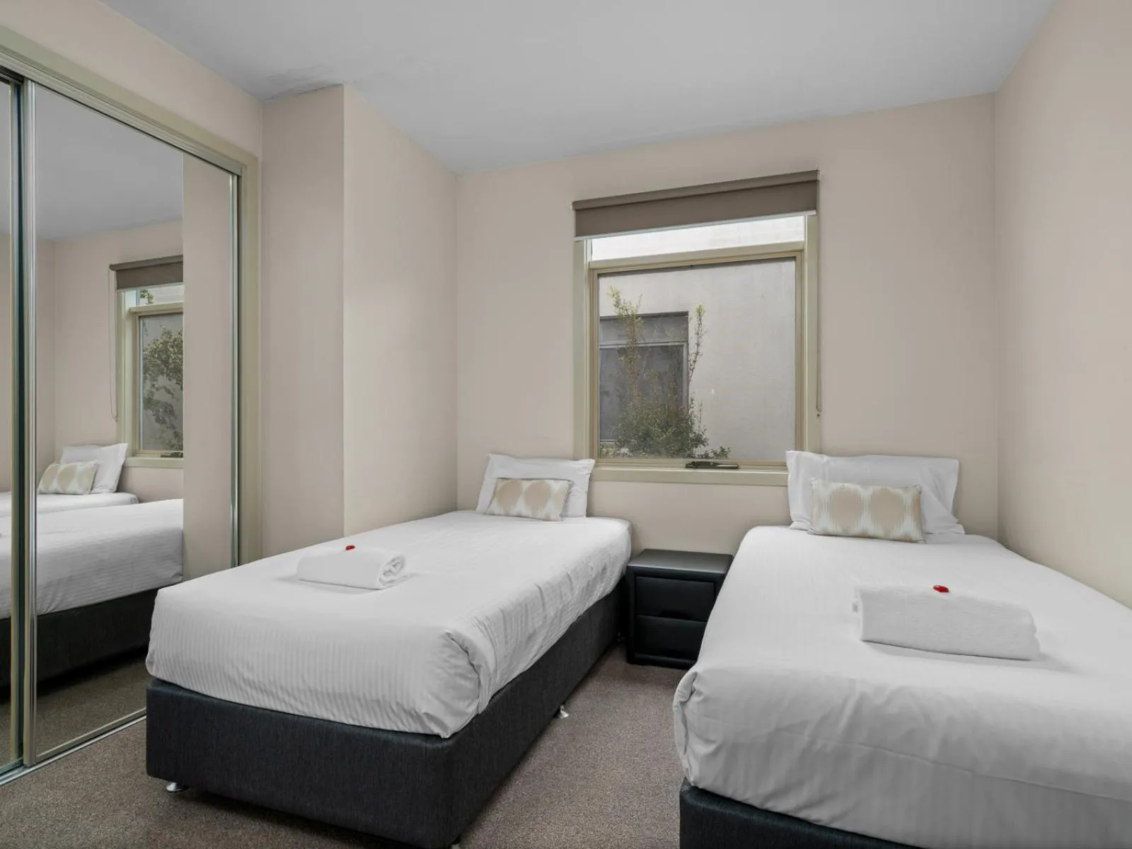 Bed in Central Shepparton Apartments