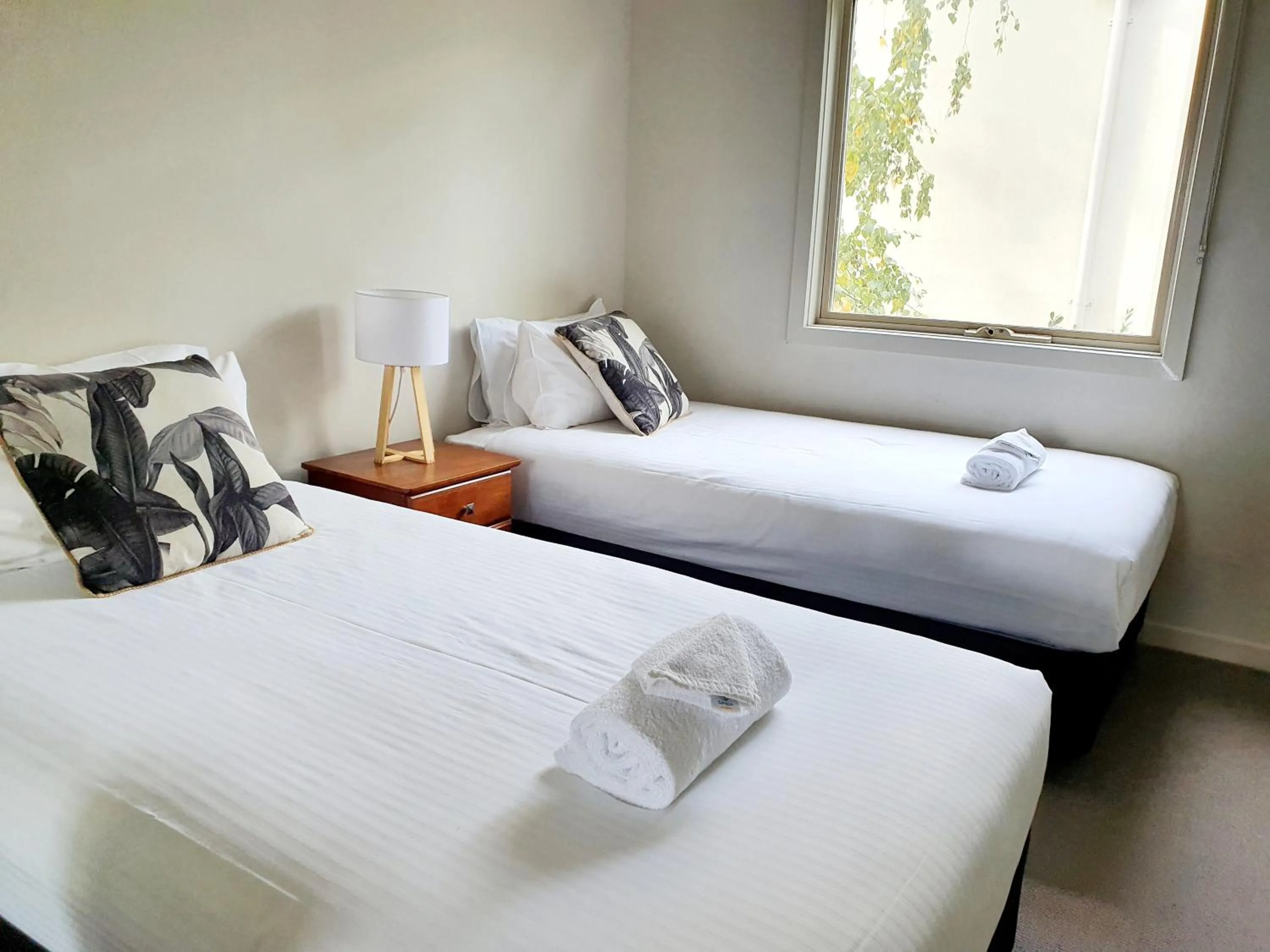 Bed in Central Shepparton Apartments