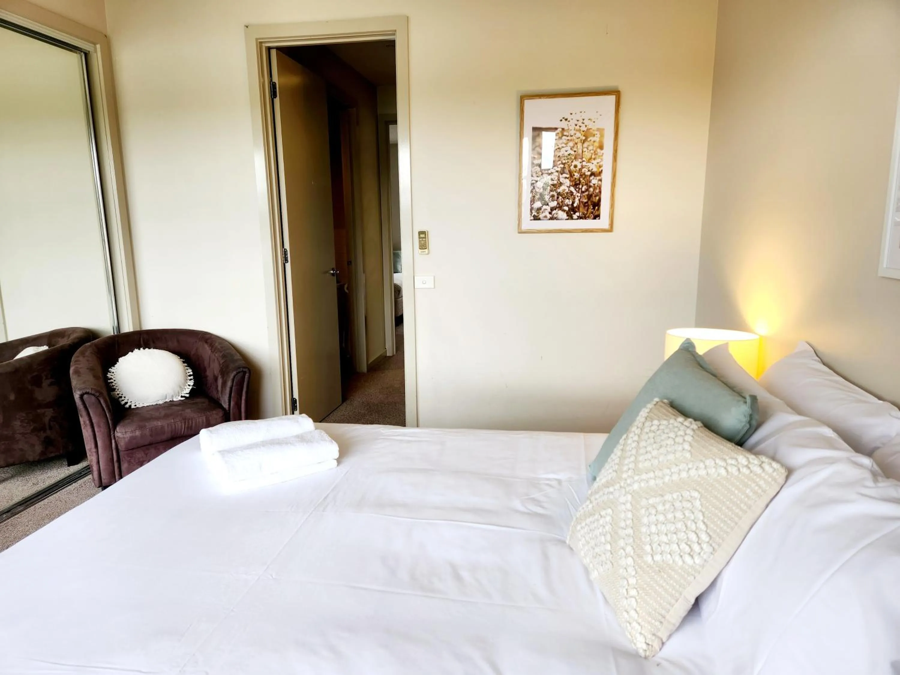 Bed in Central Shepparton Apartments