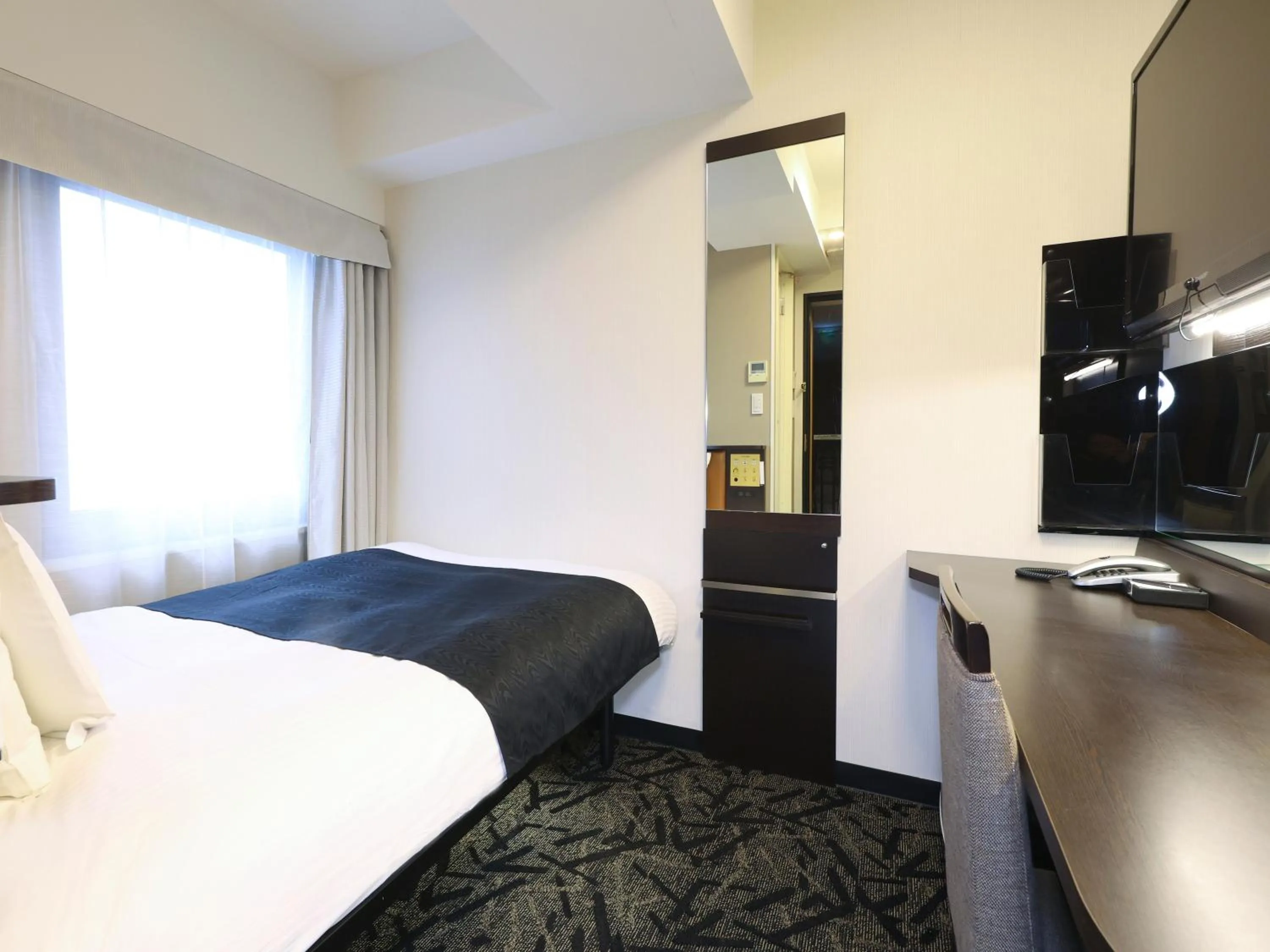 Photo of the whole room, Bed in APA Hotel Akihabara Ekimae
