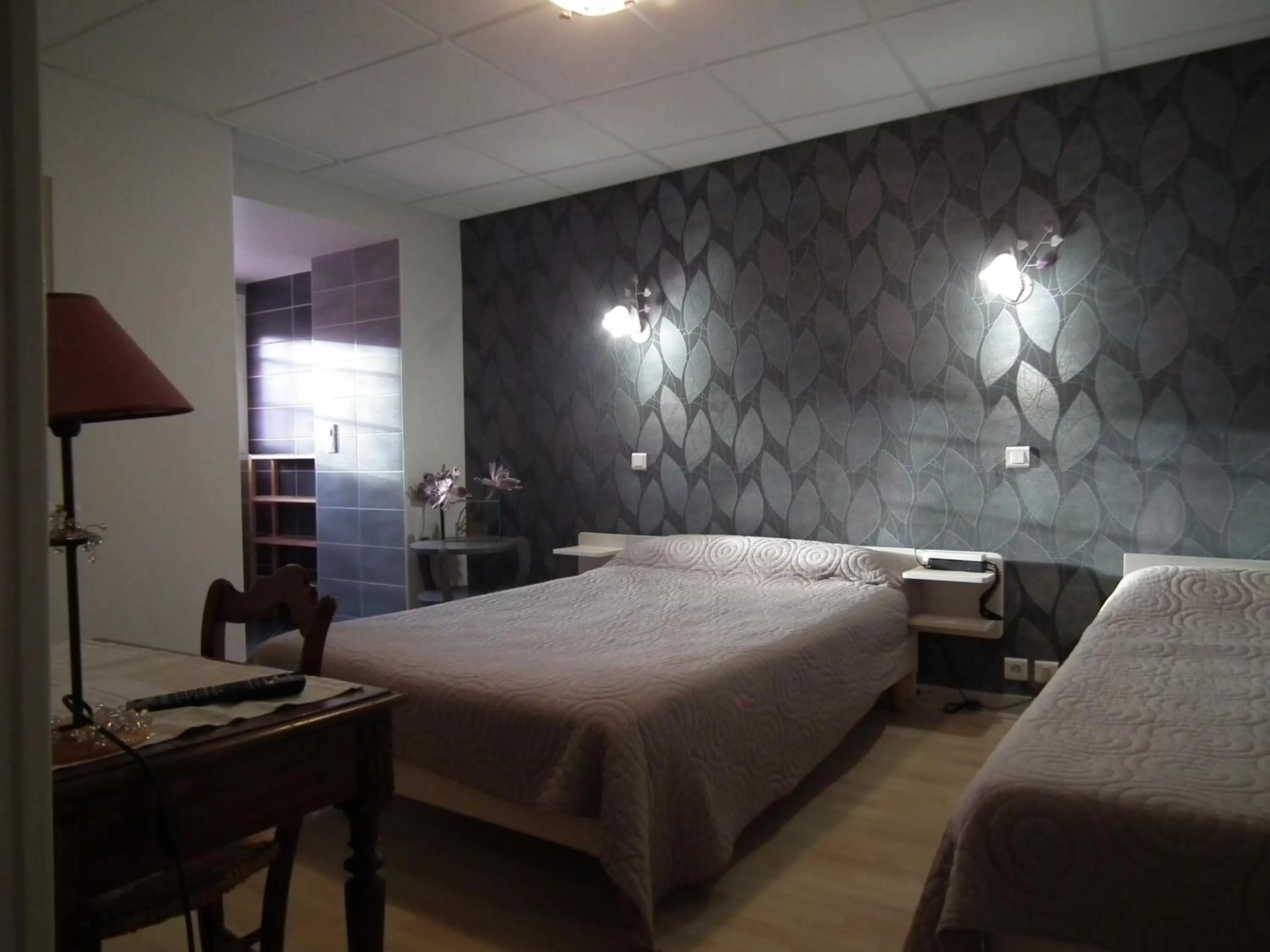 Property building, Bed in hôtel Piellenia