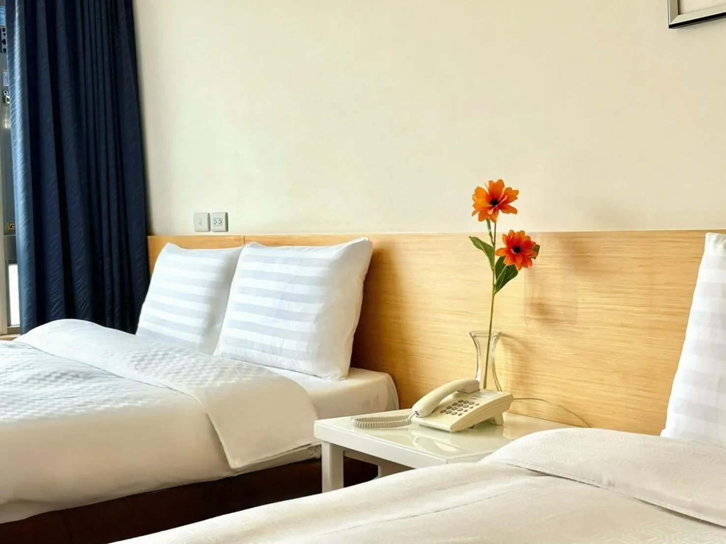 Bed in Wemeet Hotel Taipei