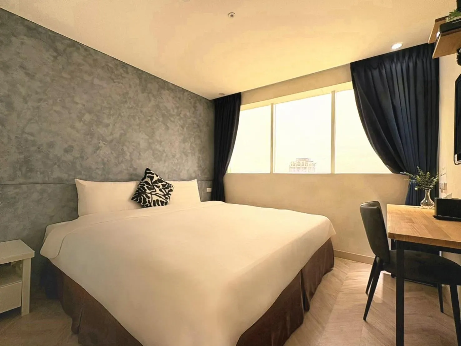 Bed in Wemeet Hotel Taipei