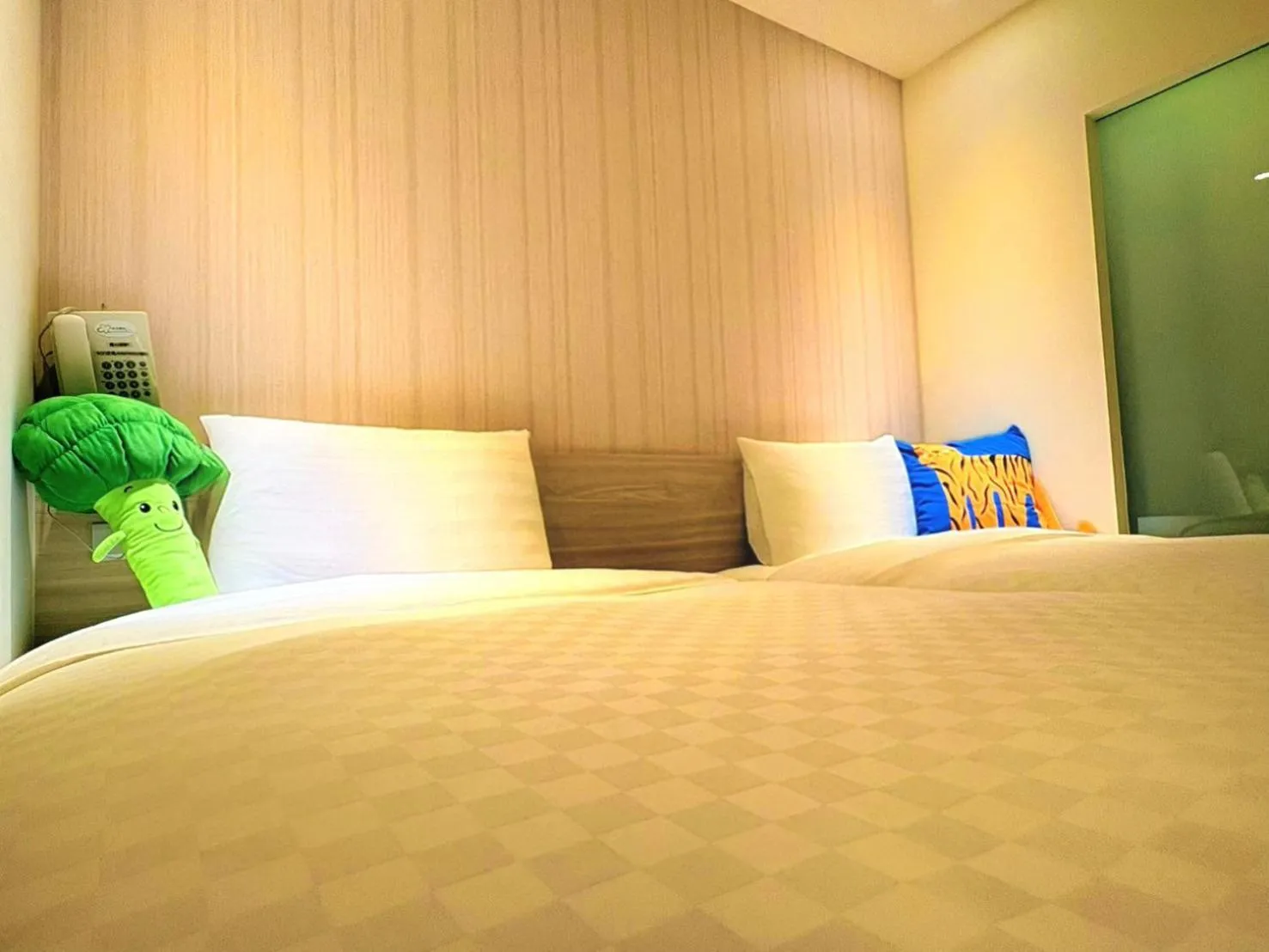 Bed in Wemeet Hotel Taipei