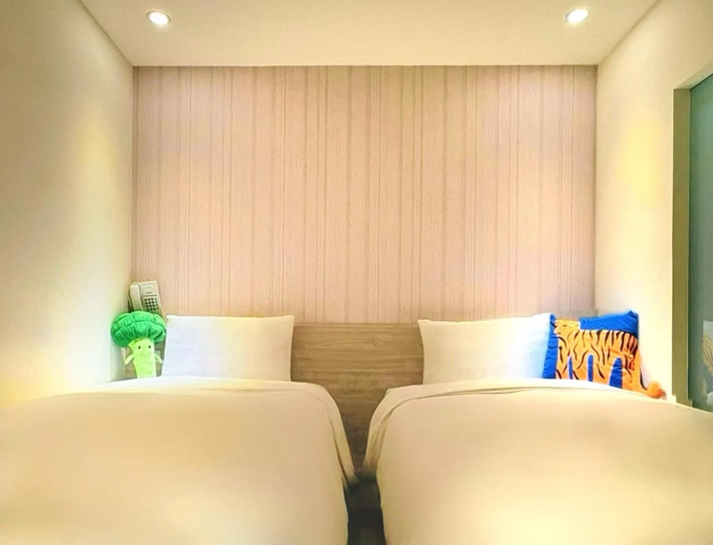 Bed in Wemeet Hotel Taipei