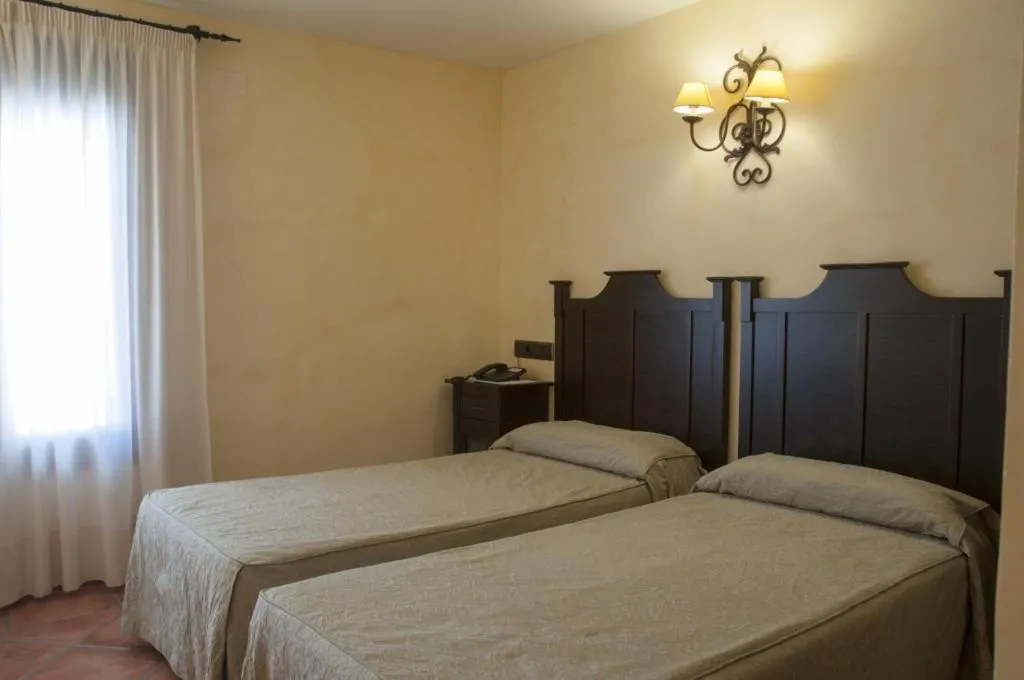 Bedroom, Bed in Hostal Rural Los Telares