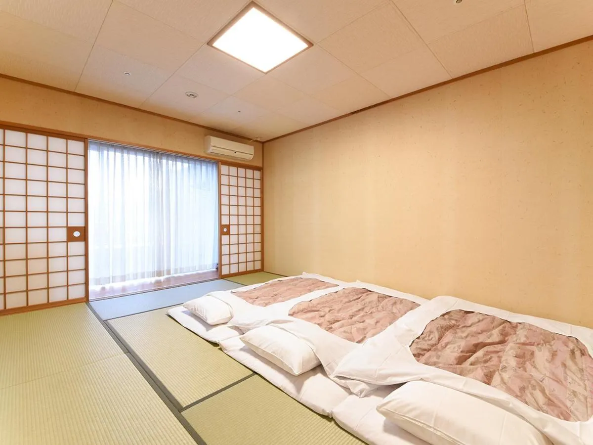Photo of the whole room, Bed in New Sunpia Tsuruga