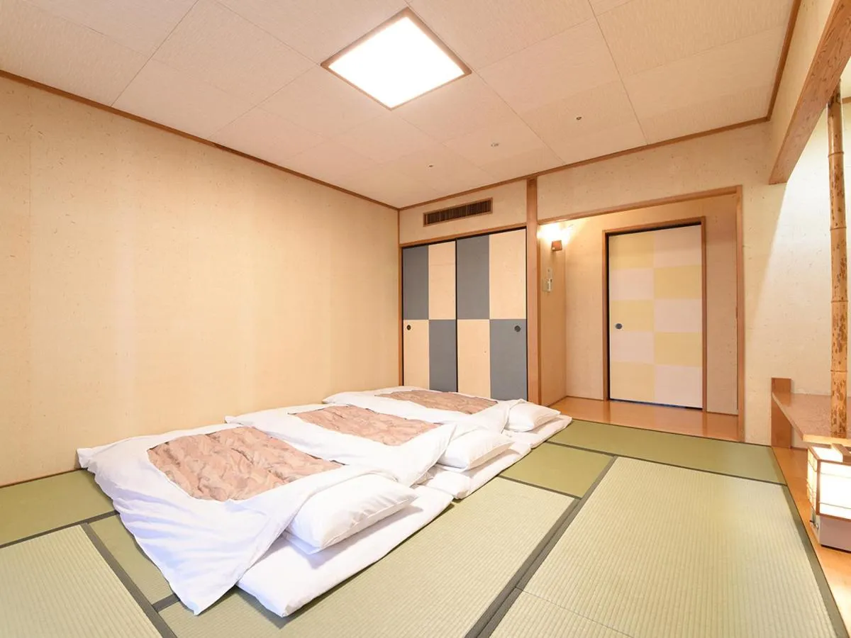 Photo of the whole room, Bed in New Sunpia Tsuruga