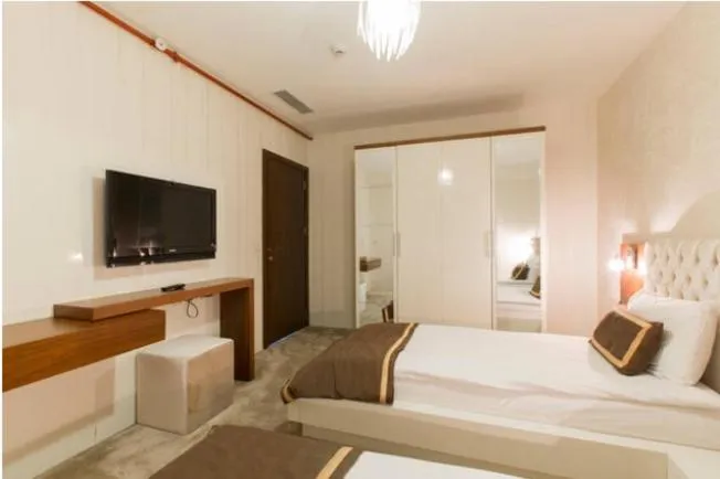 Bed in Golf Royal Residence