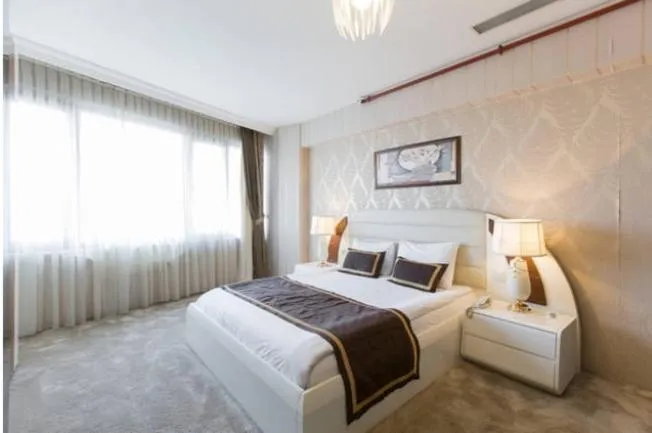 Bed in Golf Royal Residence