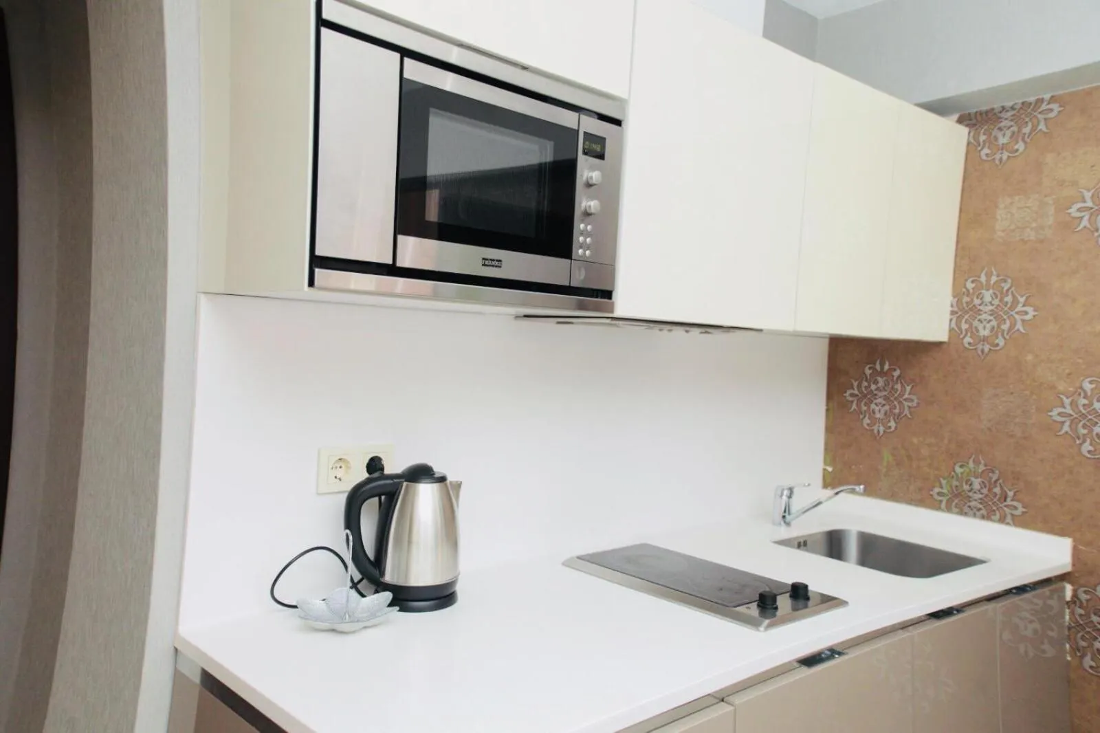 Coffee/tea facilities in Golf Royal Residence