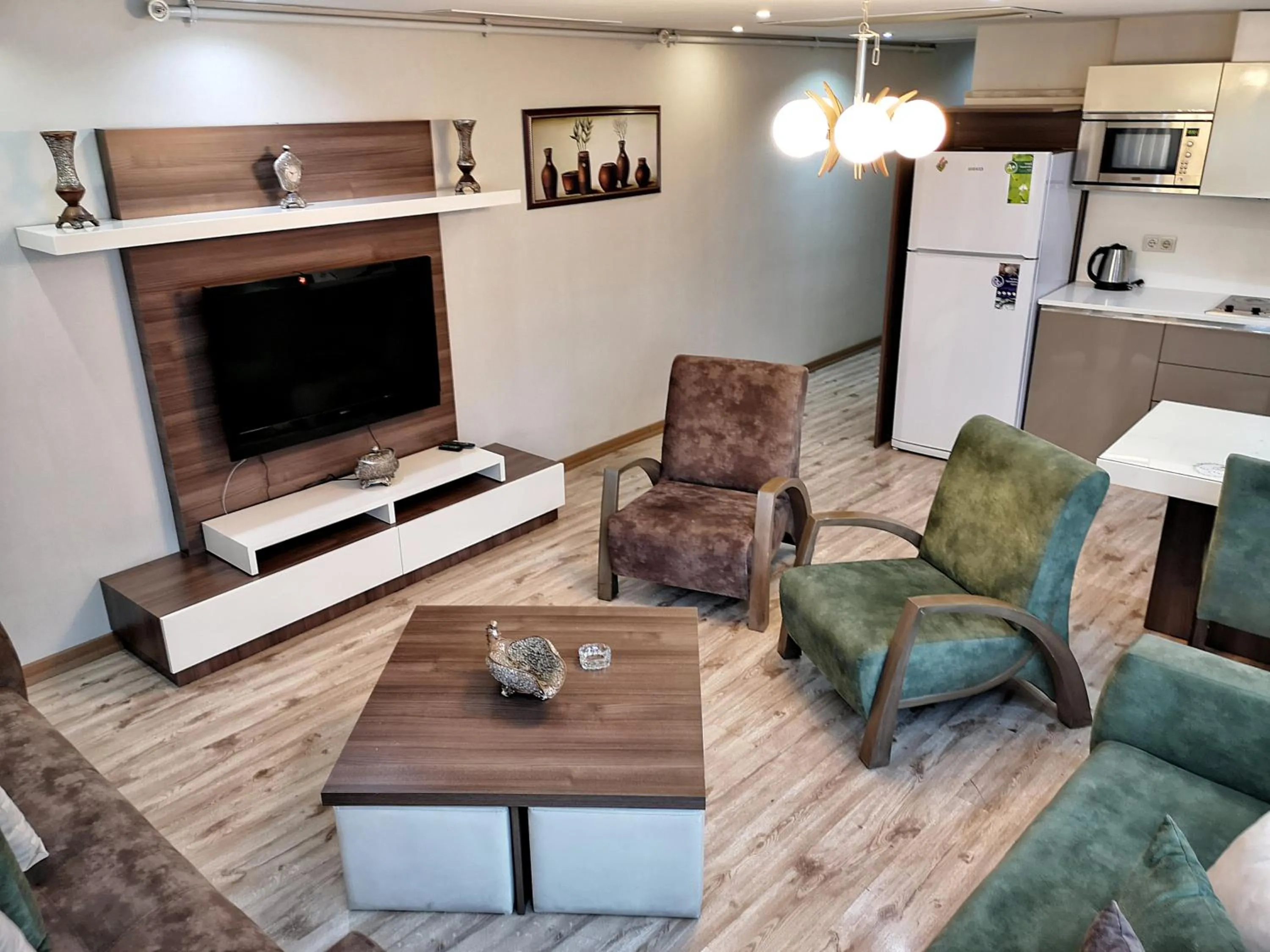 Communal lounge/ TV room in Golf Royal Residence