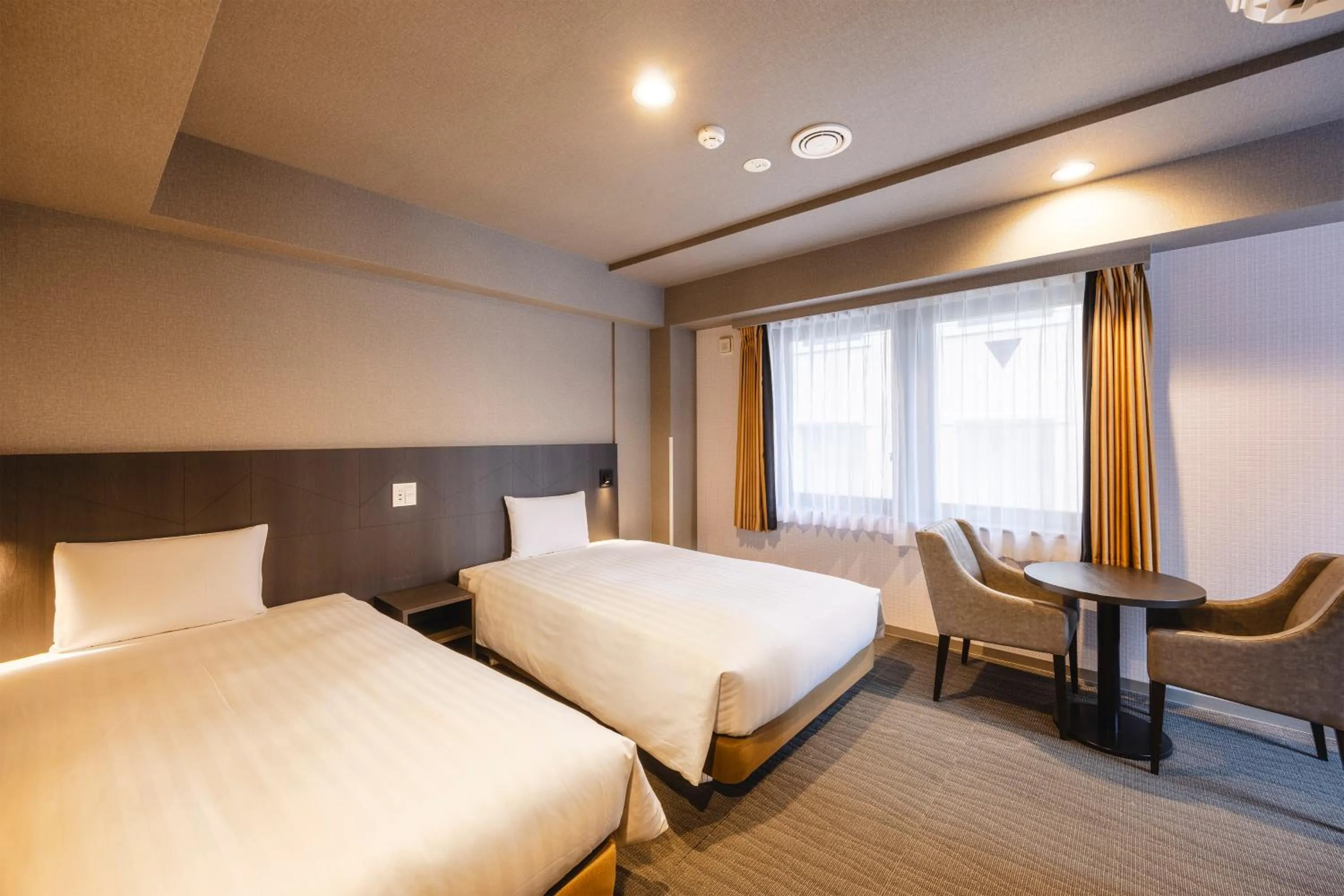 Photo of the whole room, Bed in KOKO HOTEL Shimbashi Onarimon - formerly Hotel Wing International Shimbashi Onarimon