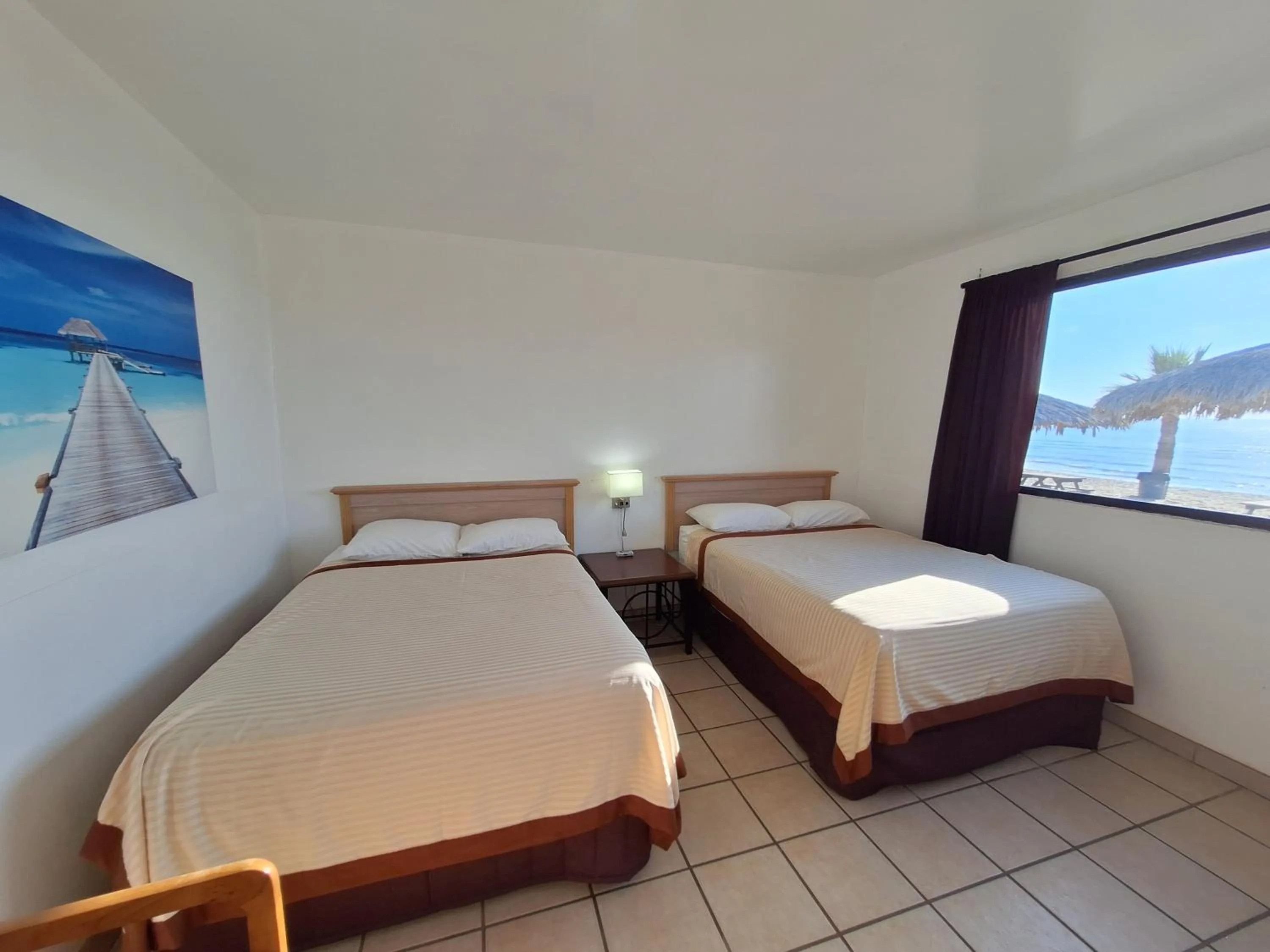 Bed in #38 Bungalow Seaside Hotel & Victors RV Park