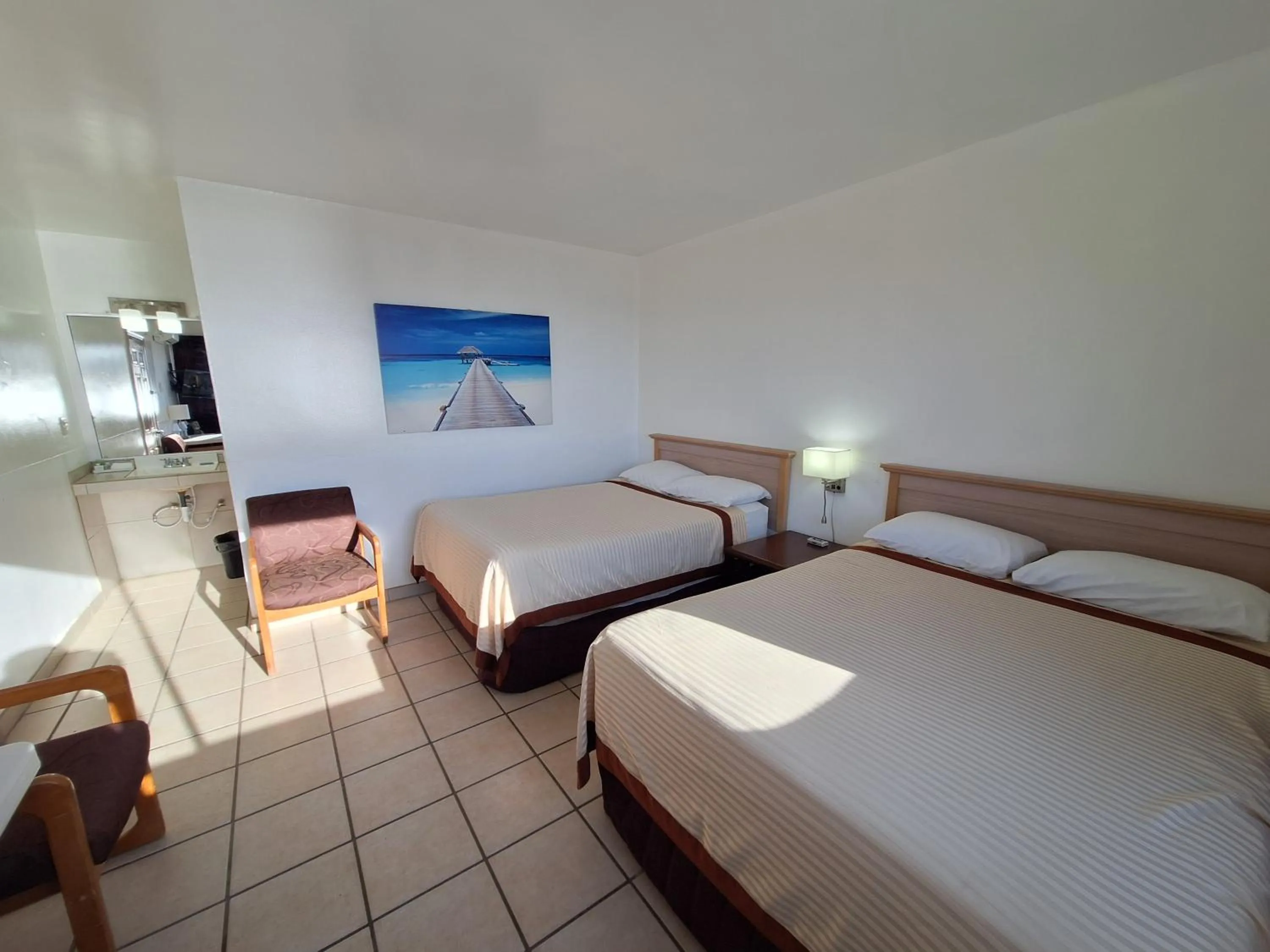 Bed in #38 Bungalow Seaside Hotel & Victors RV Park