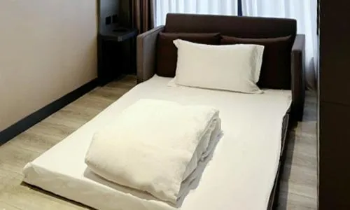 Bed in The Tango Hotel Taipei Jiantan