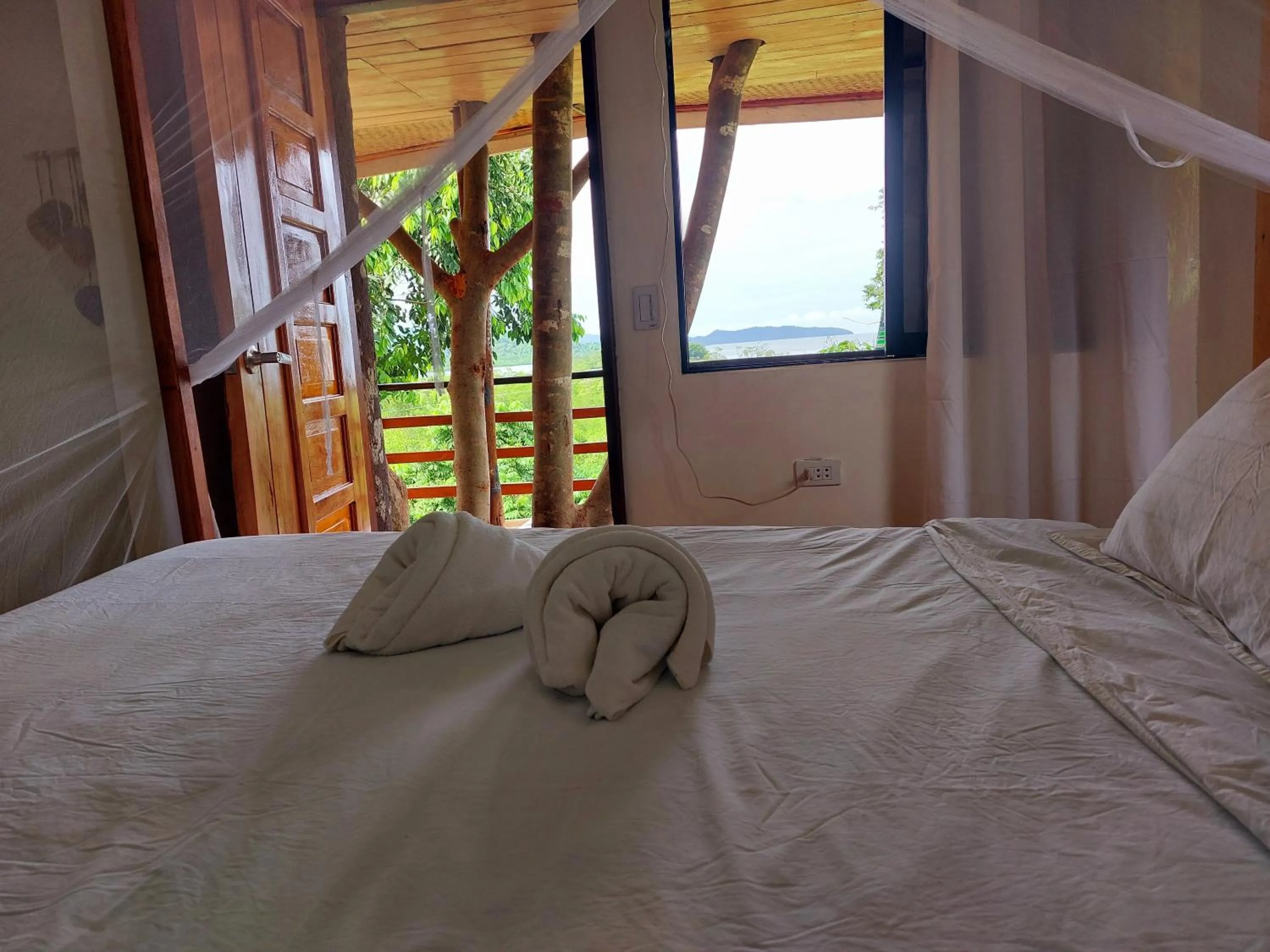 Bedroom, Bed in Jungle bar Resto & Cottages