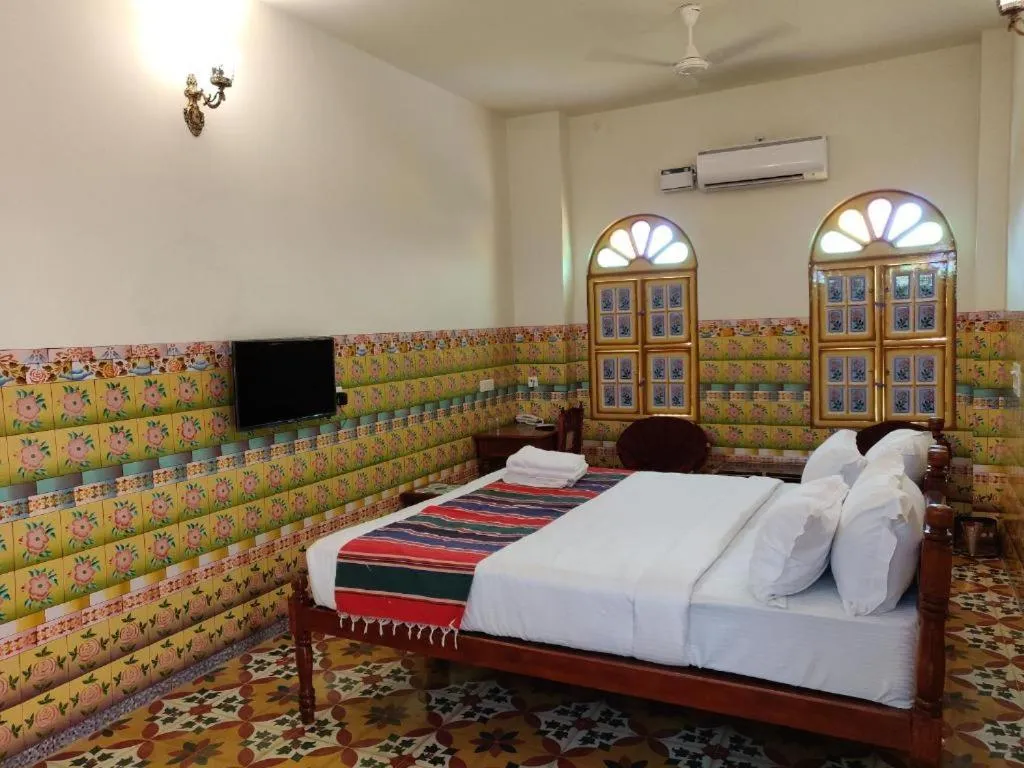 Bed in THE CHETTINAD HERITAGE