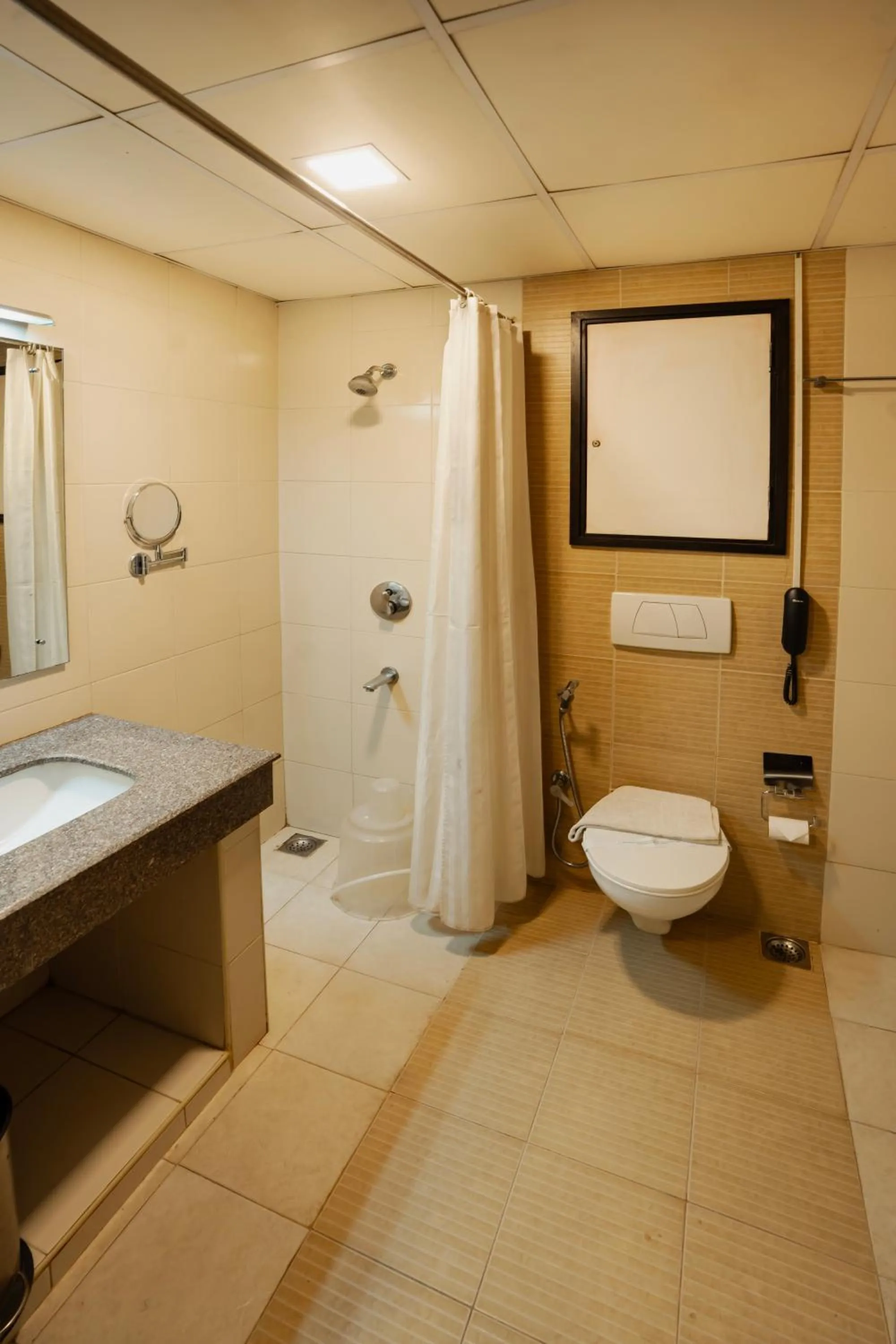 Bathroom in Hotel White Gate Residency -near to Vaikom Sri Mahadeva Temple