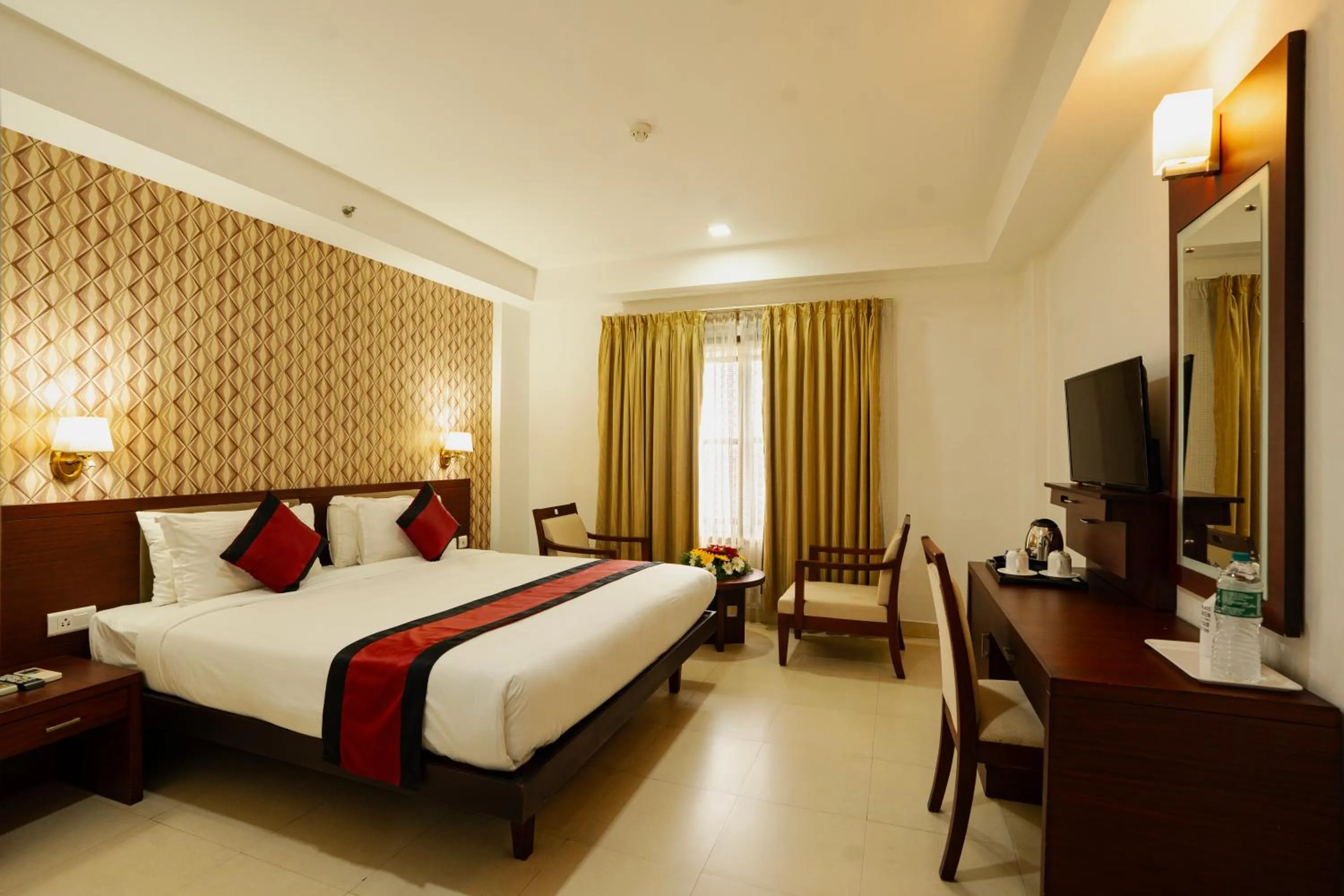 Bed in Hotel White Gate Residency -near to Vaikom Sri Mahadeva Temple